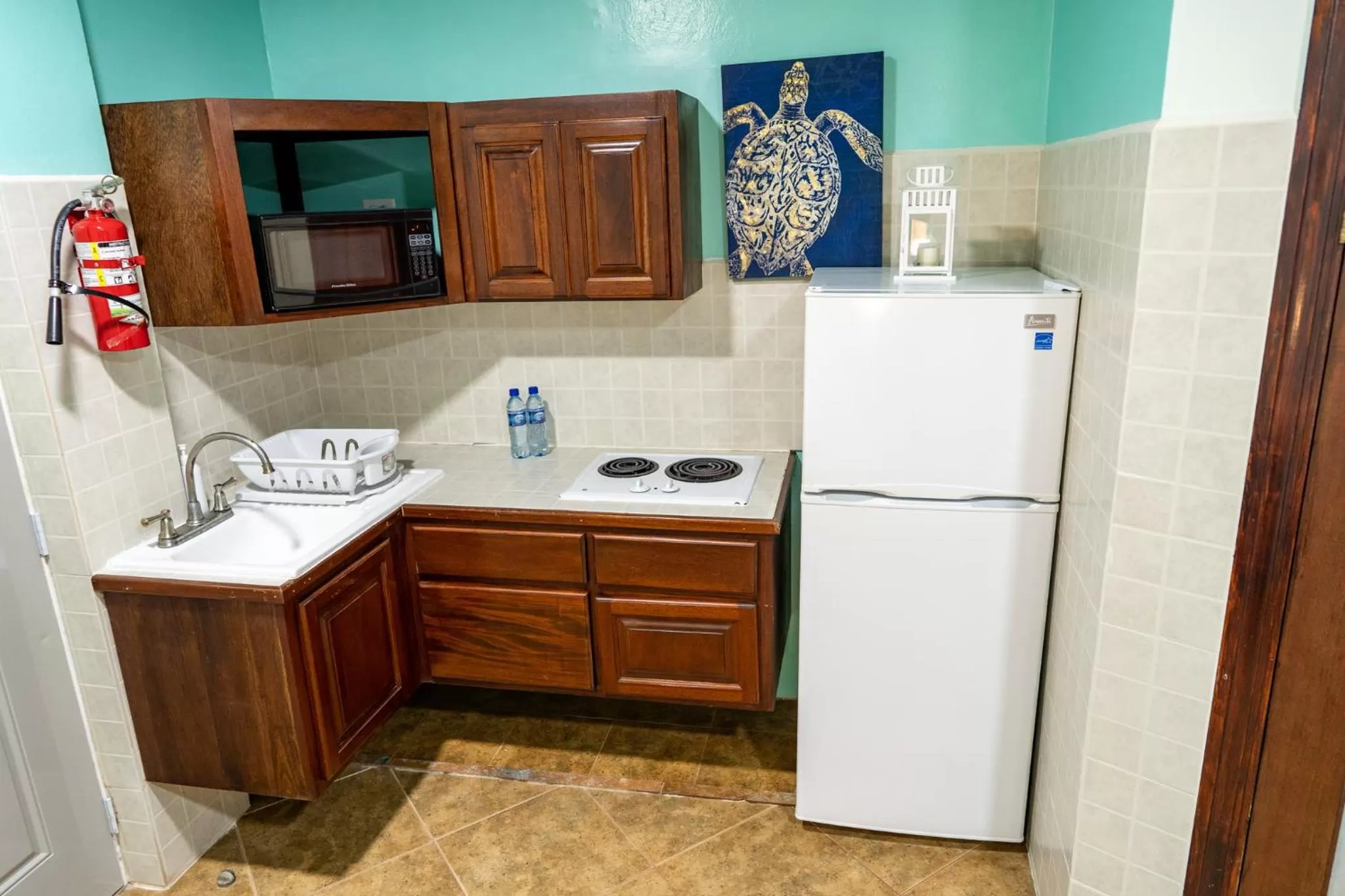 Kitchen or kitchenette in Island Magic Beach Resort