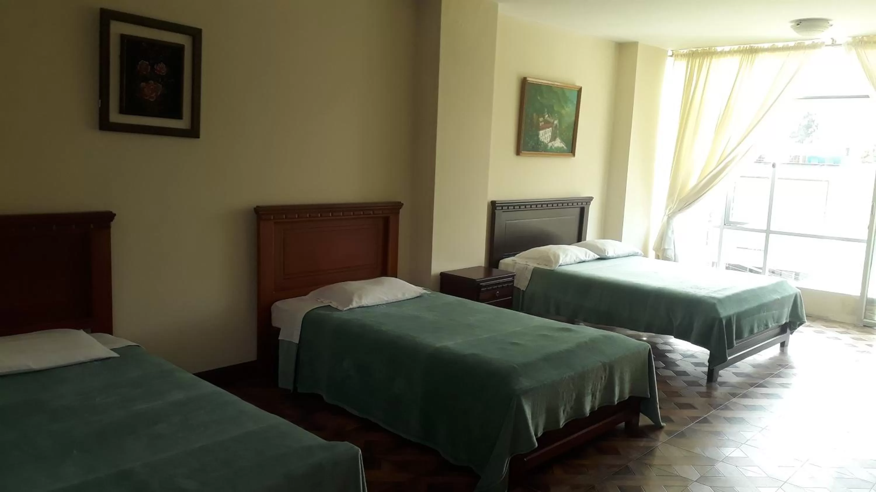 Bed in El Cardenal Hotel