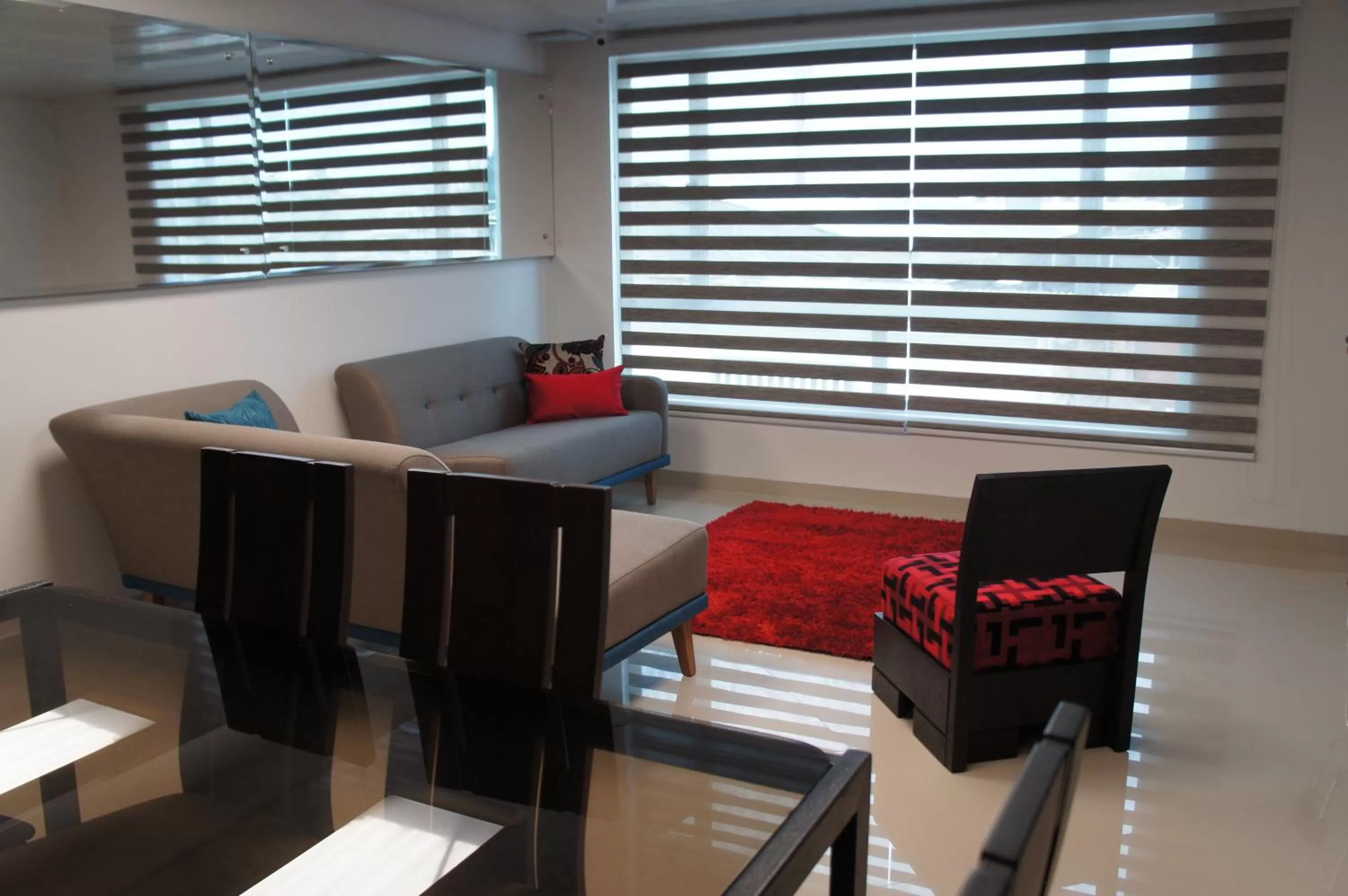 Communal lounge/ TV room in Hotel Casa Huesped Kiwi