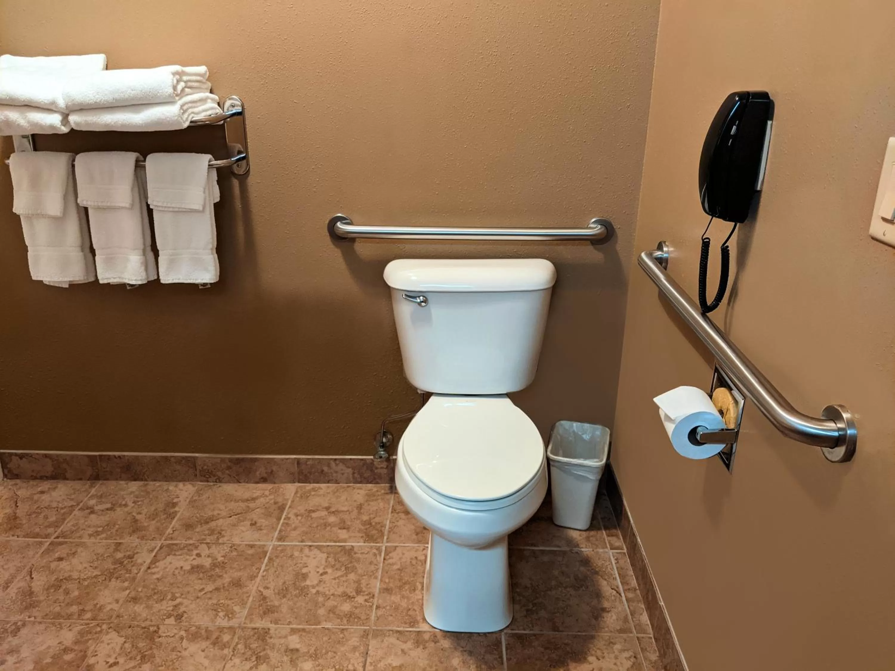 Toilet in Cobblestone Inn & Suites - Denison | Majestic Hills