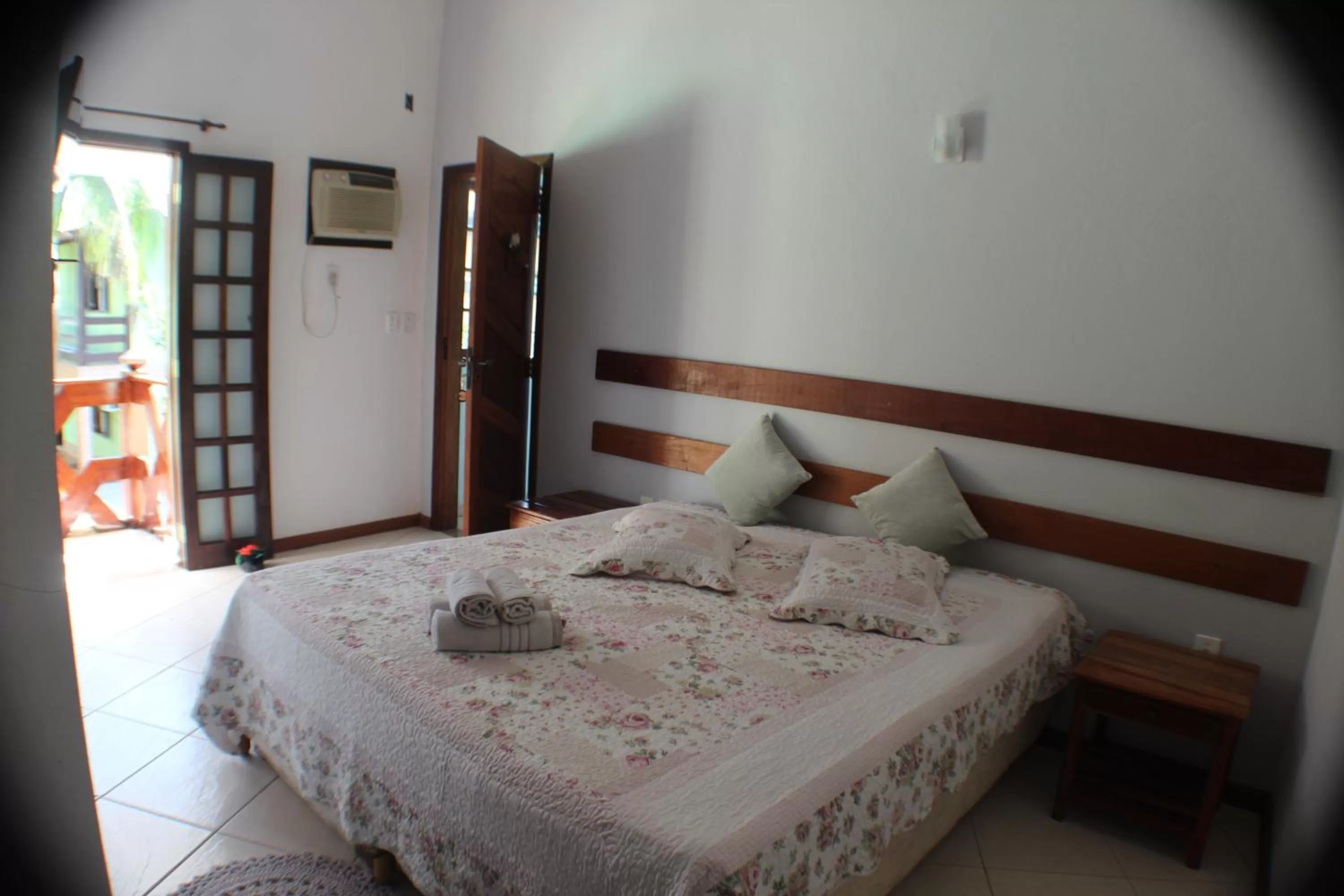 Bed in Pousada Flor de Paraty