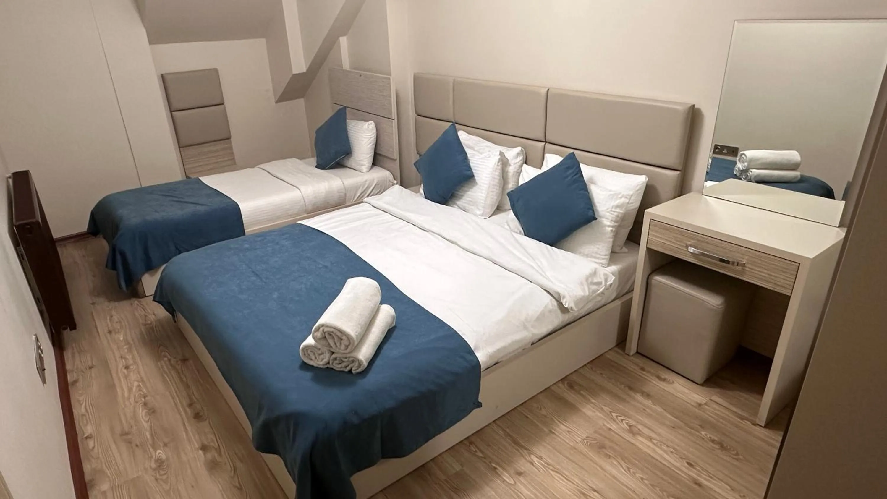 Bed in Overland Residence