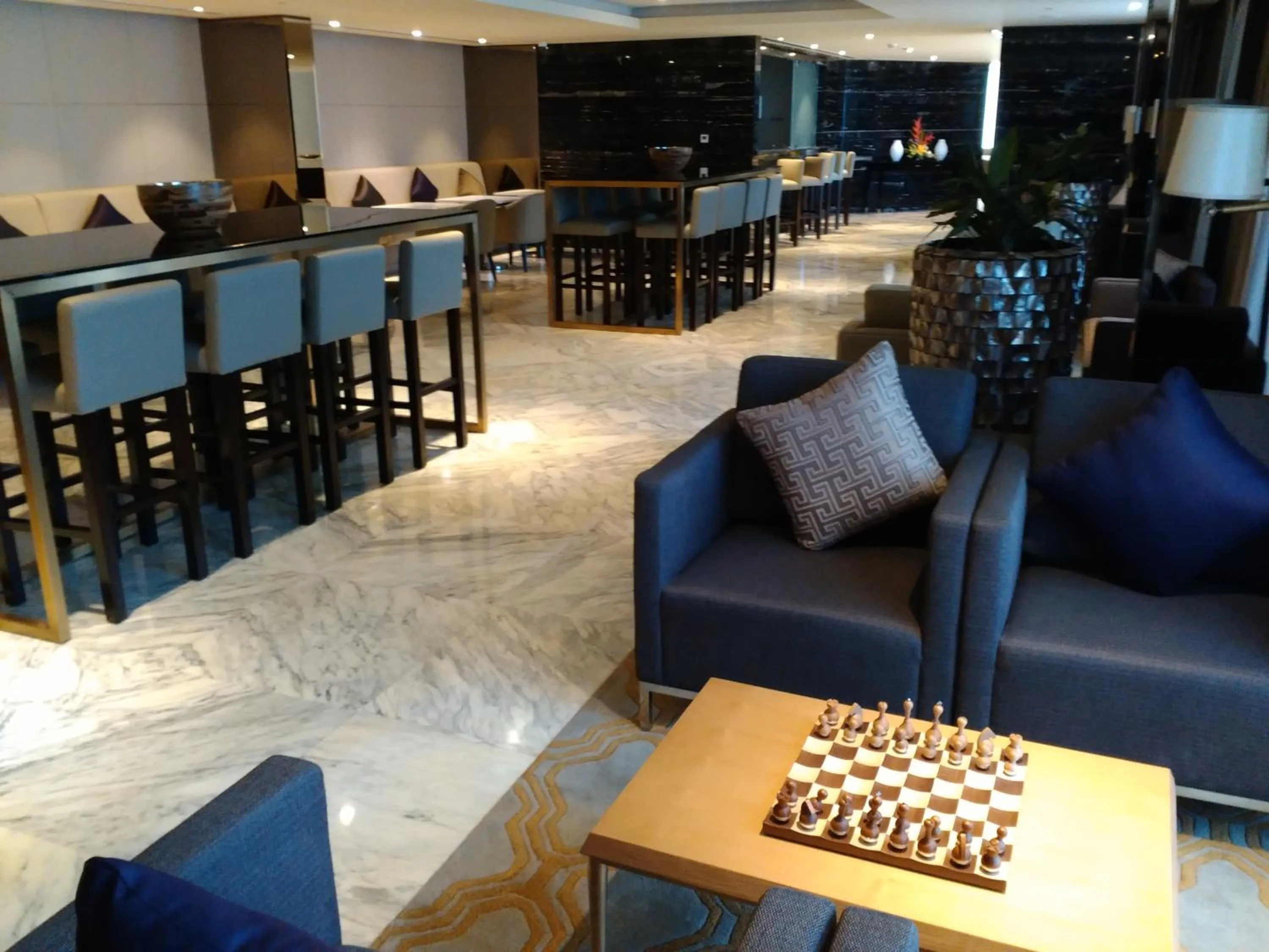 Communal lounge/ TV room in Grand Millennium Muscat