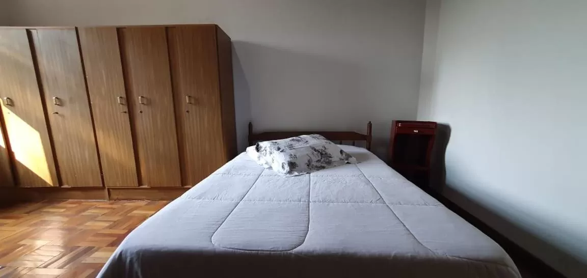 Bed in Apart Hotel Flomon