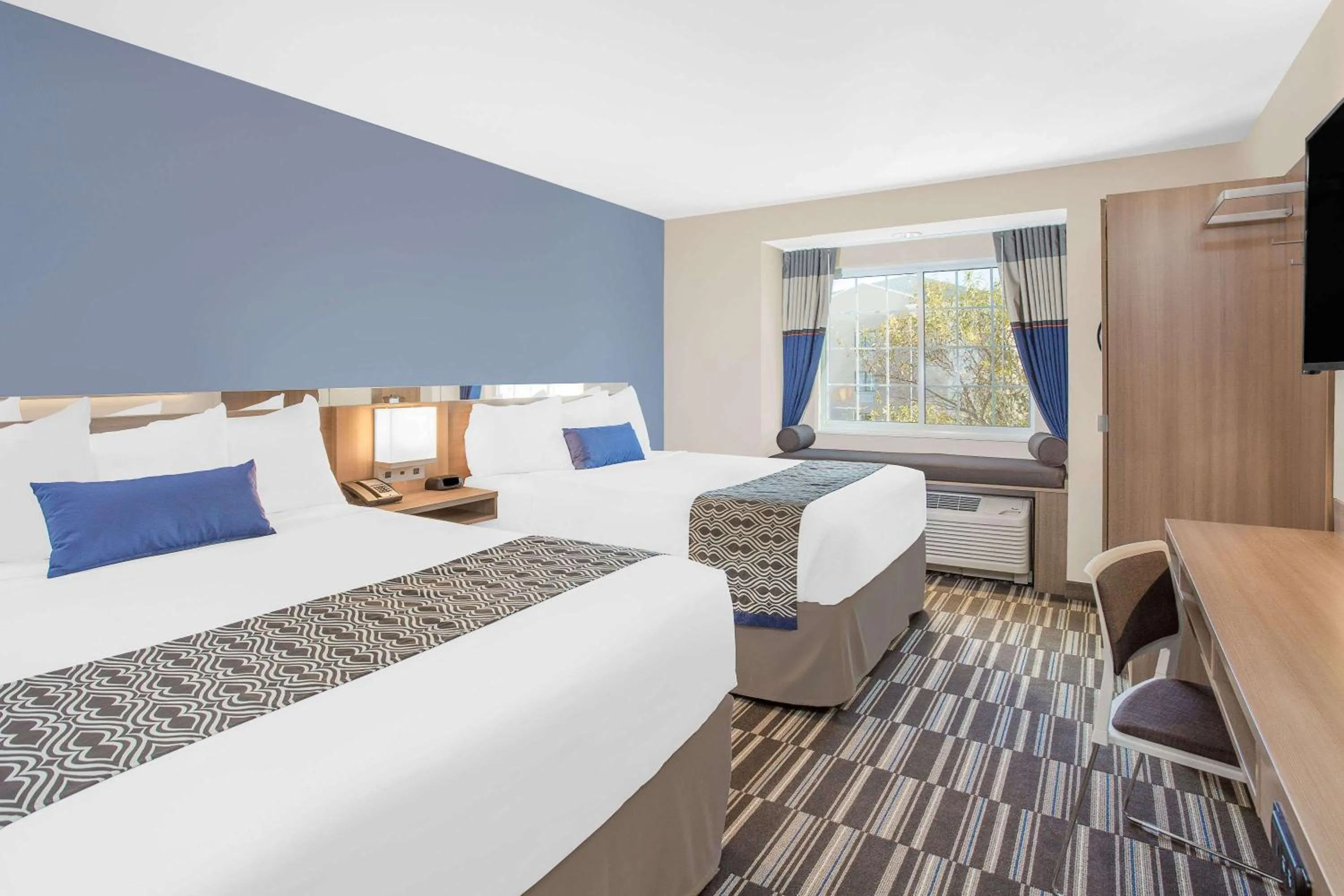 Photo of the whole room, Bed in Microtel Inn & Suites by Wyndham Ocean City