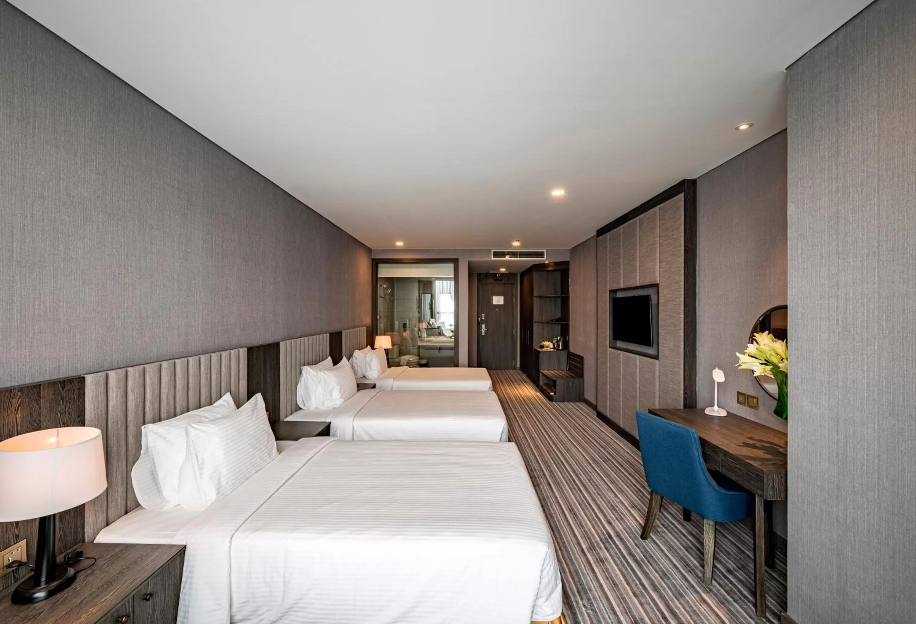 Deluxe Triple Room in Muong Thanh Luxury Saigon Hotel