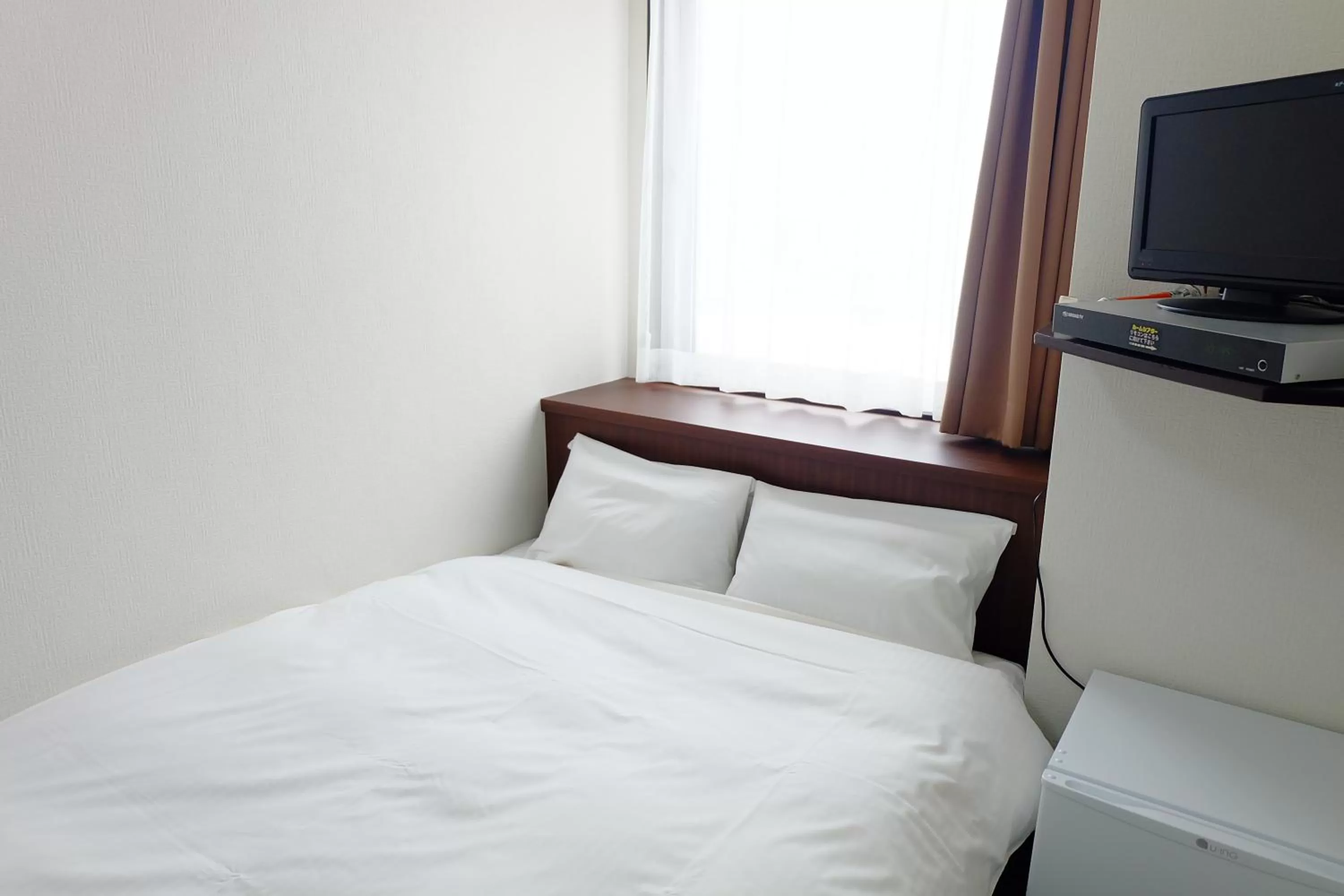 Bed in Tabist Hotel Tetora Hakodate Station