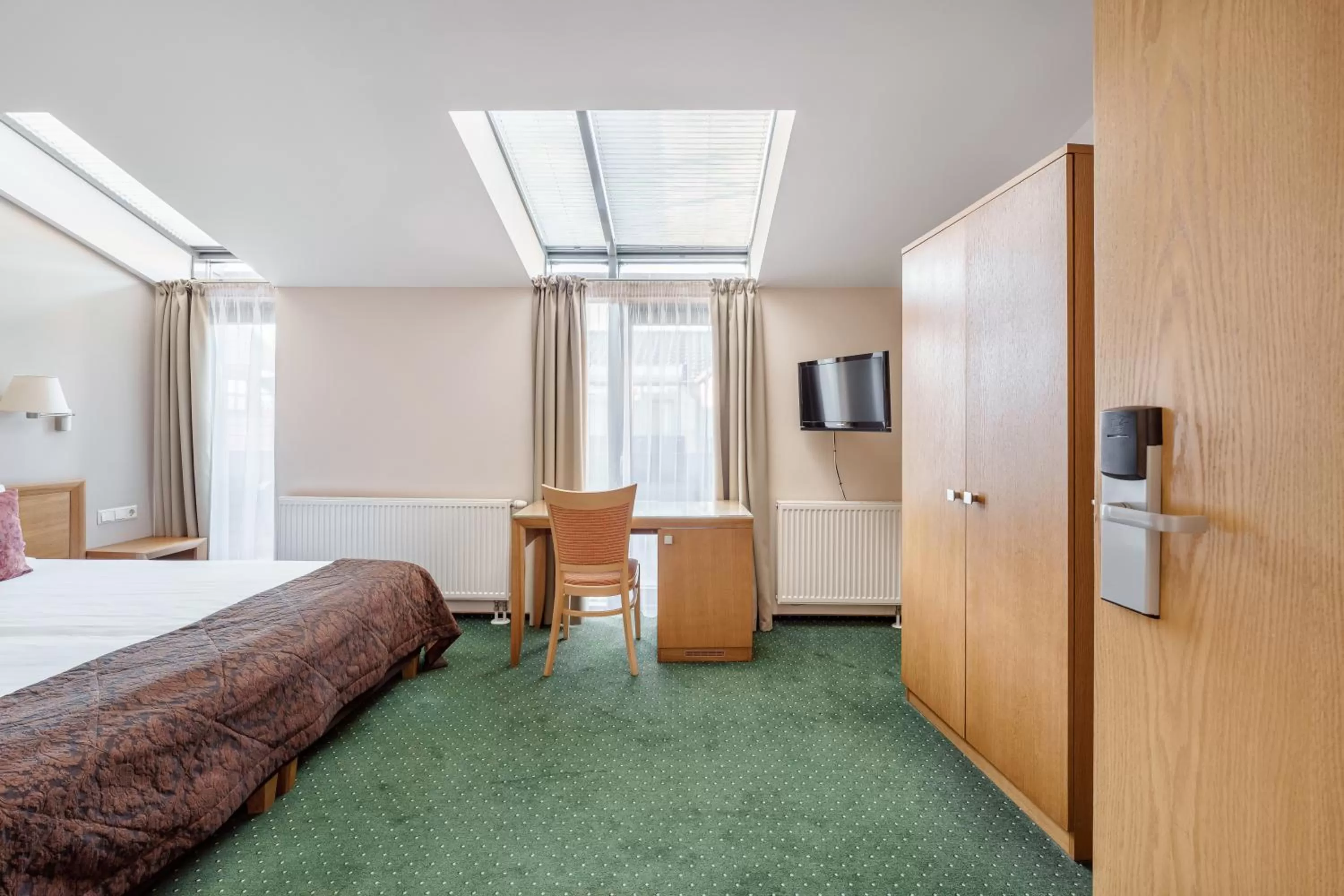 Bed in Euterpe Hotel