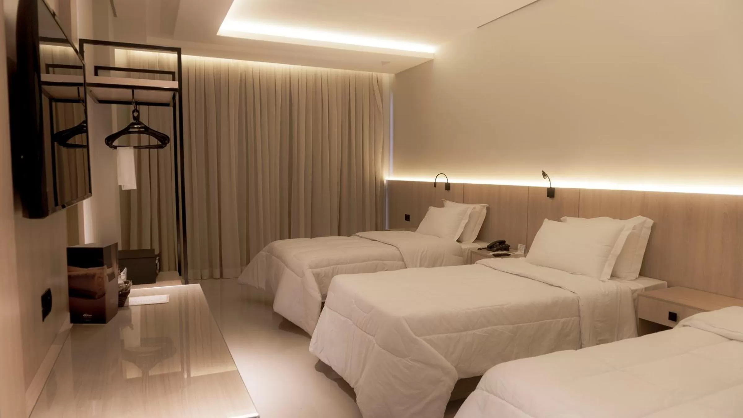 Bed in Rafain Palace Hotel & Convention Center