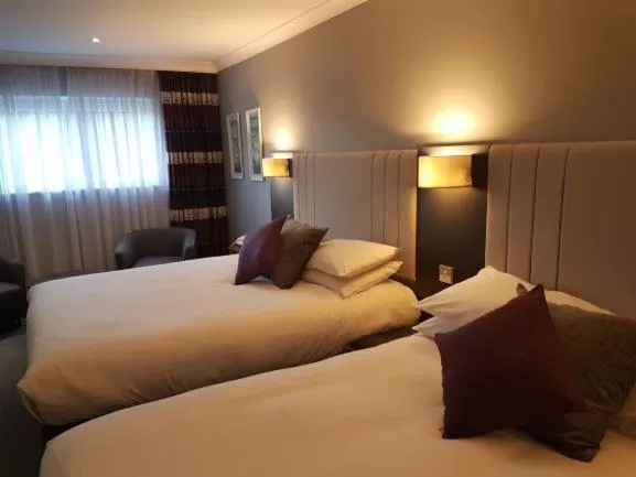 Bedroom, Bed in The Diplomat Hotel Restaurant & Spa