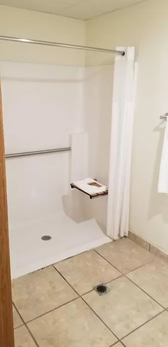 Bathroom in Baymont by Wyndham Harlan