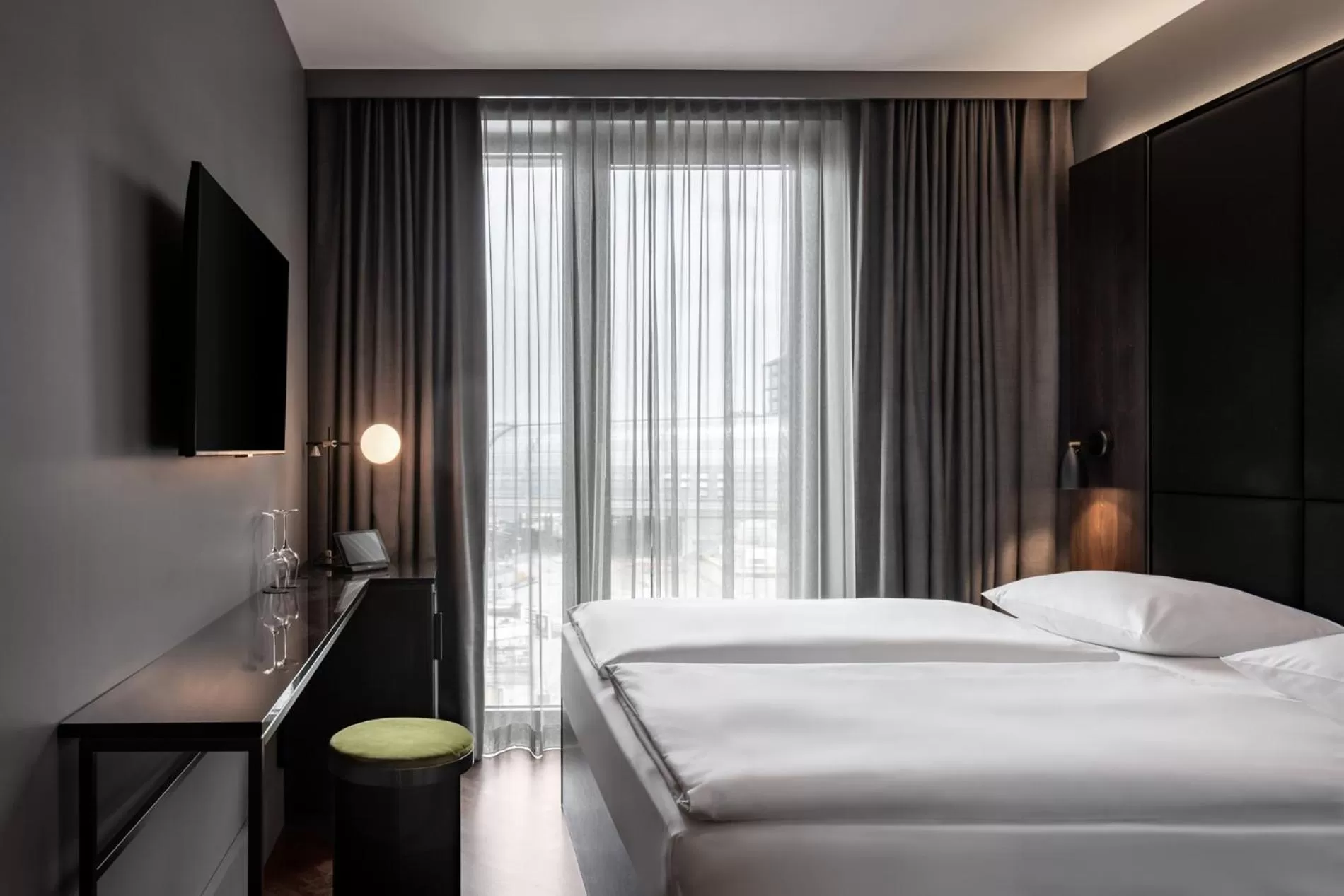 Bed in Hotel ROMY by AMANO