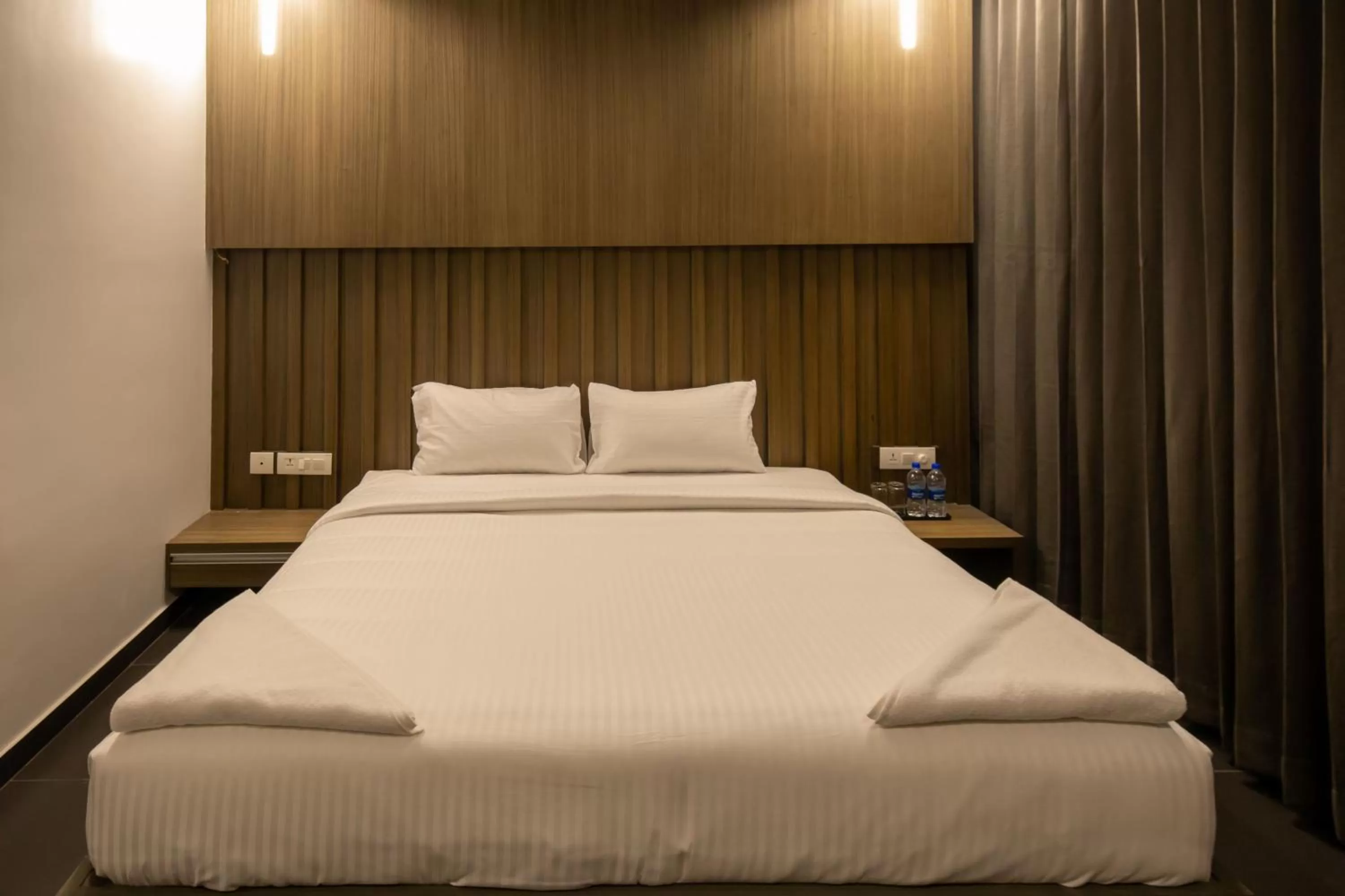 Photo of the whole room, Bed in RATHNA RESIDENCY - Near US CONSULATE