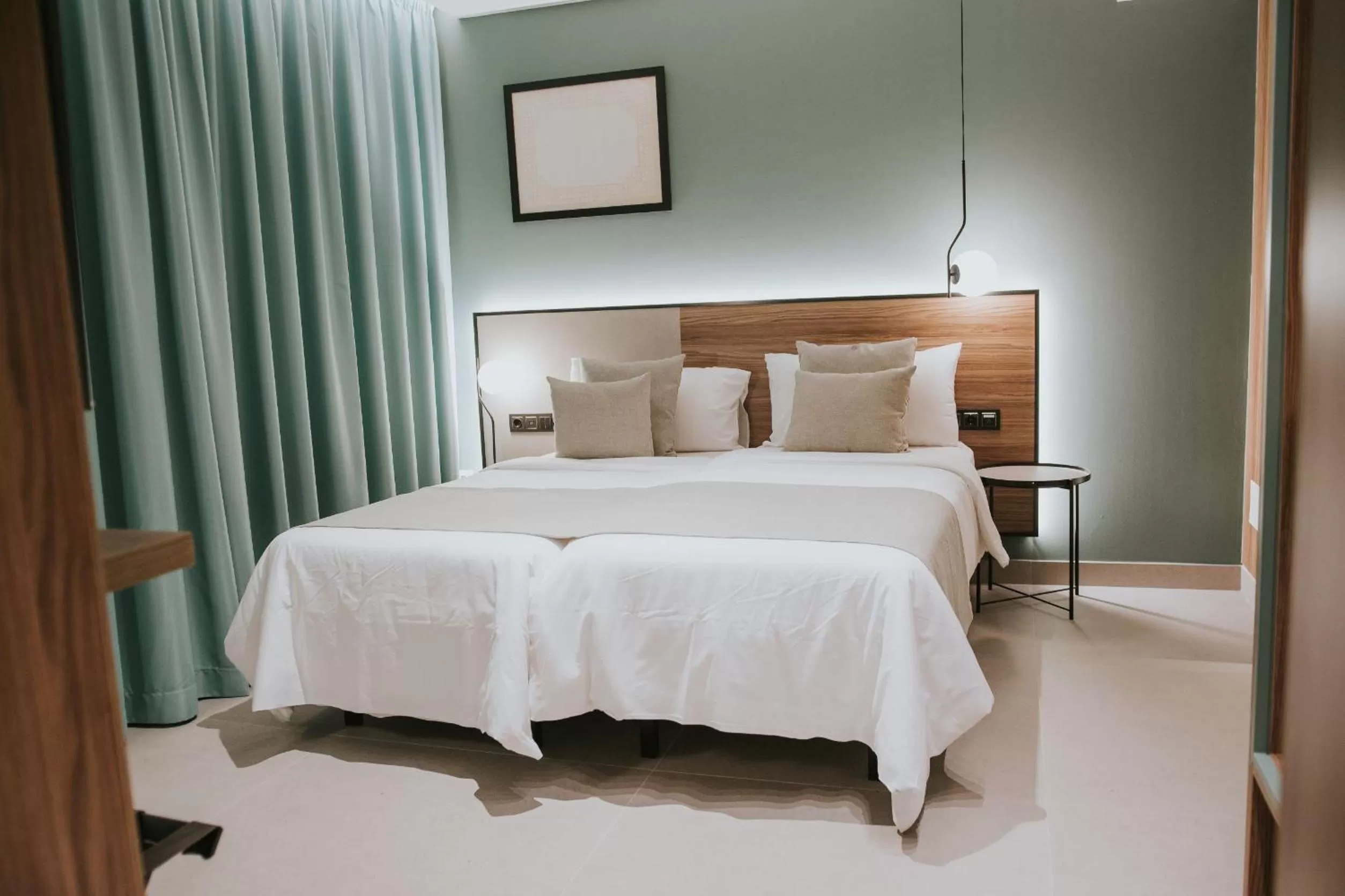 Bed in Catalina Plaza Hotel Sostenible