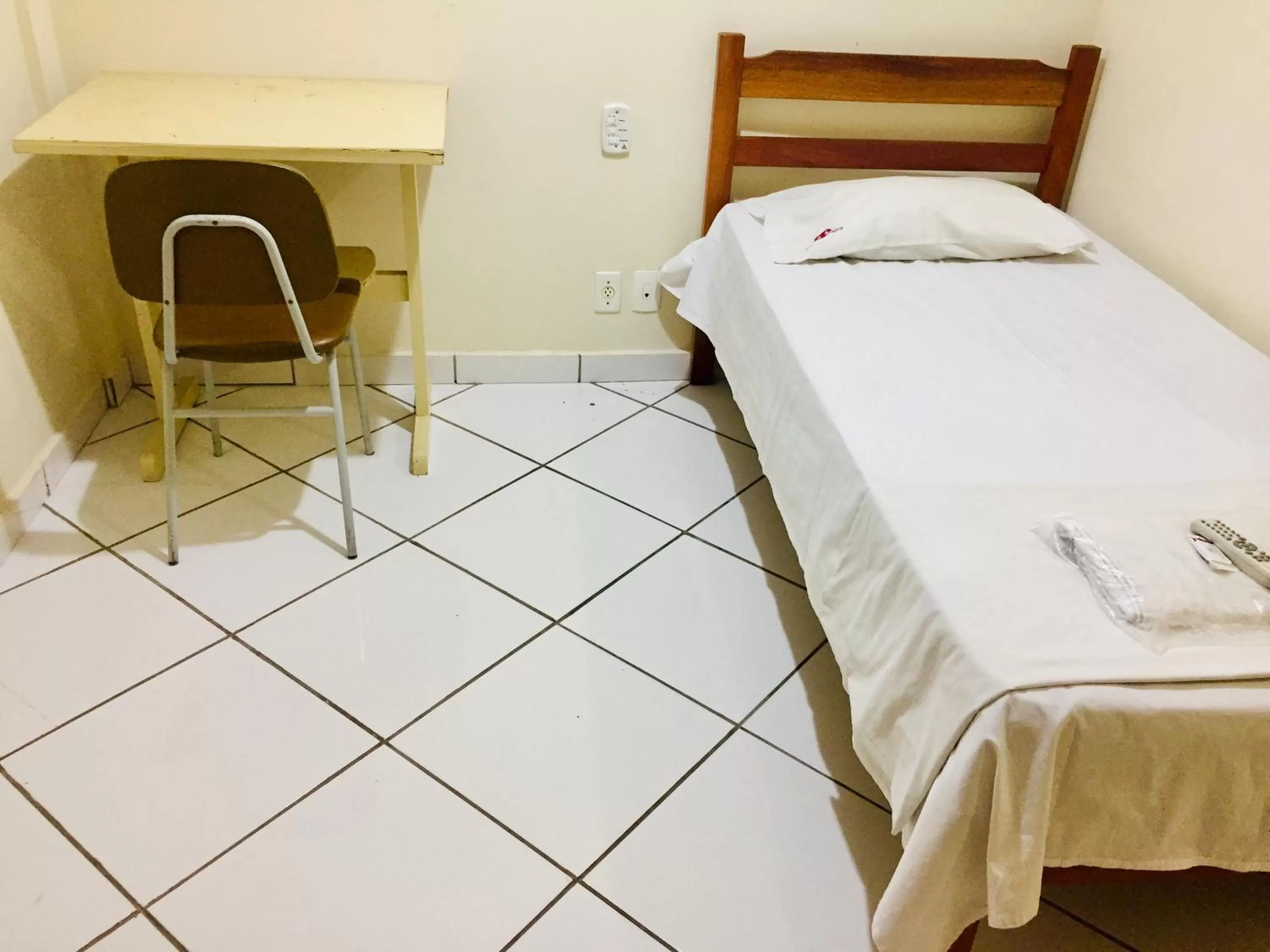 Bed in Hotel Oliveira