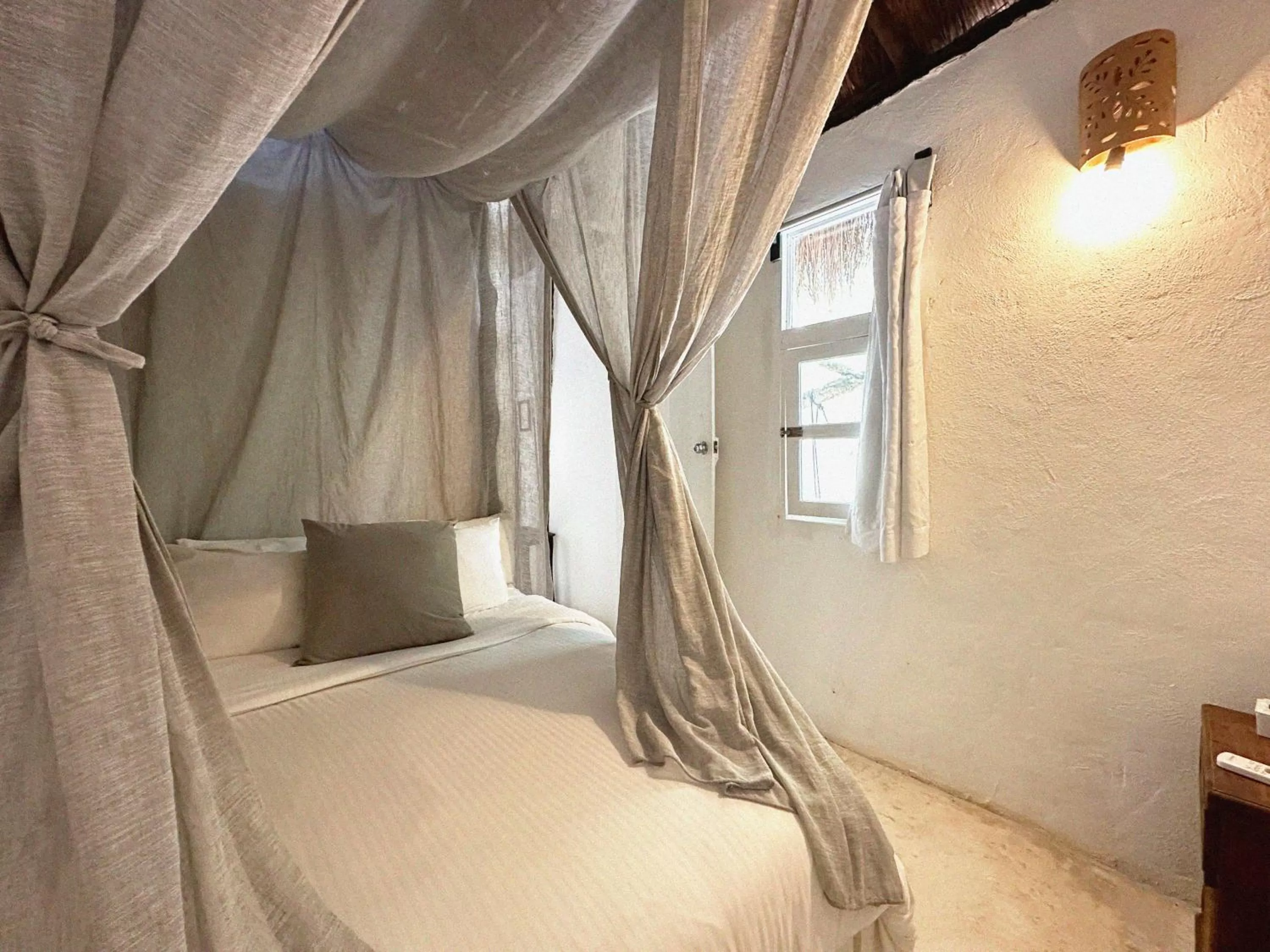 Bed in Coco Tulum Zen Zone Hotel