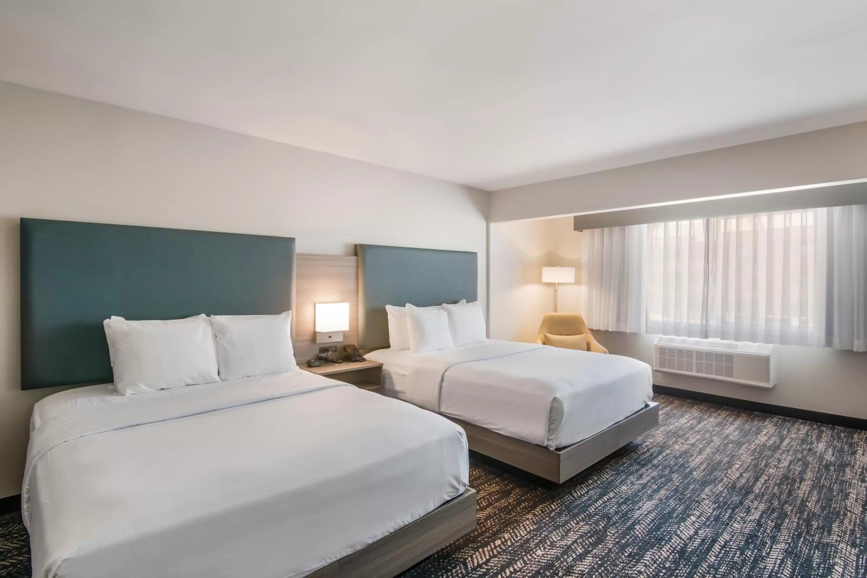 Bed in Hourglass Hotel, an Ascend Collection Hotel