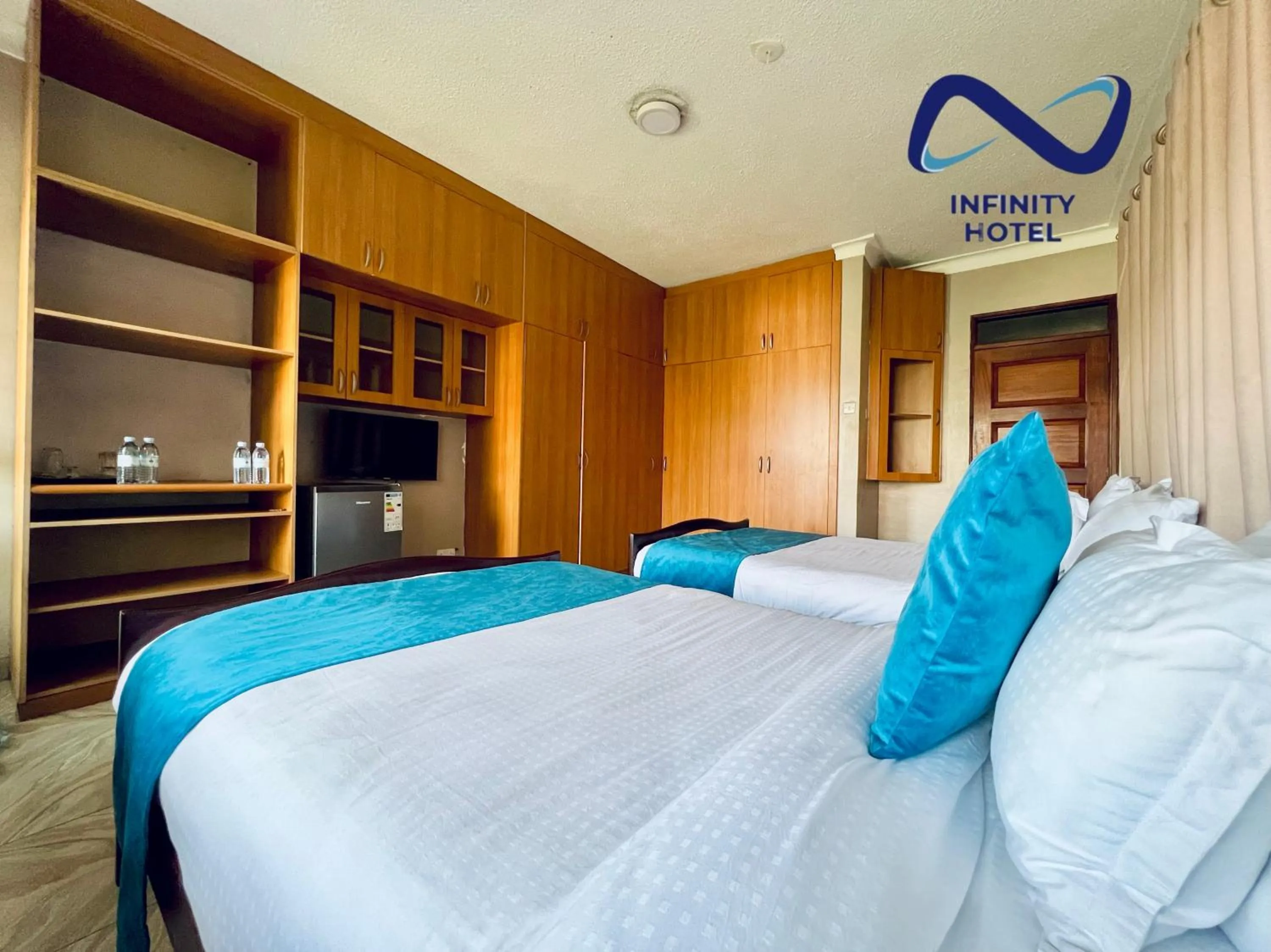 Bedroom, Bed in Infinity Hotel Kampala