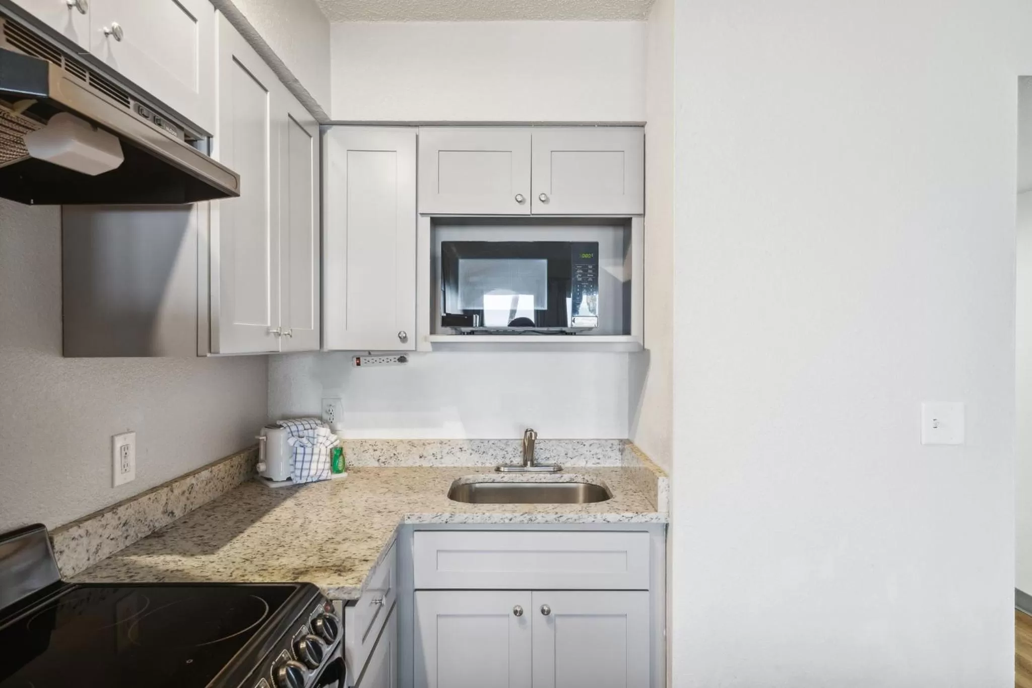 kitchen in Sugar Sands Beachfront Hotel, a By The Sea Resort