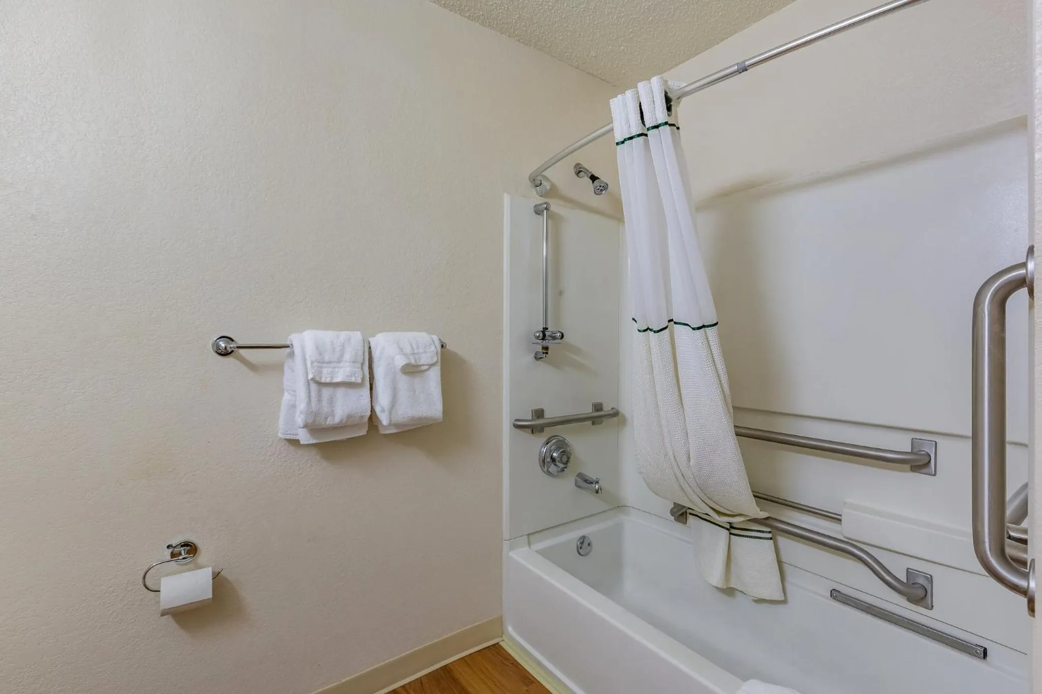 Bathroom in HomeTowne Studios by Red Roof Gainesville, GA