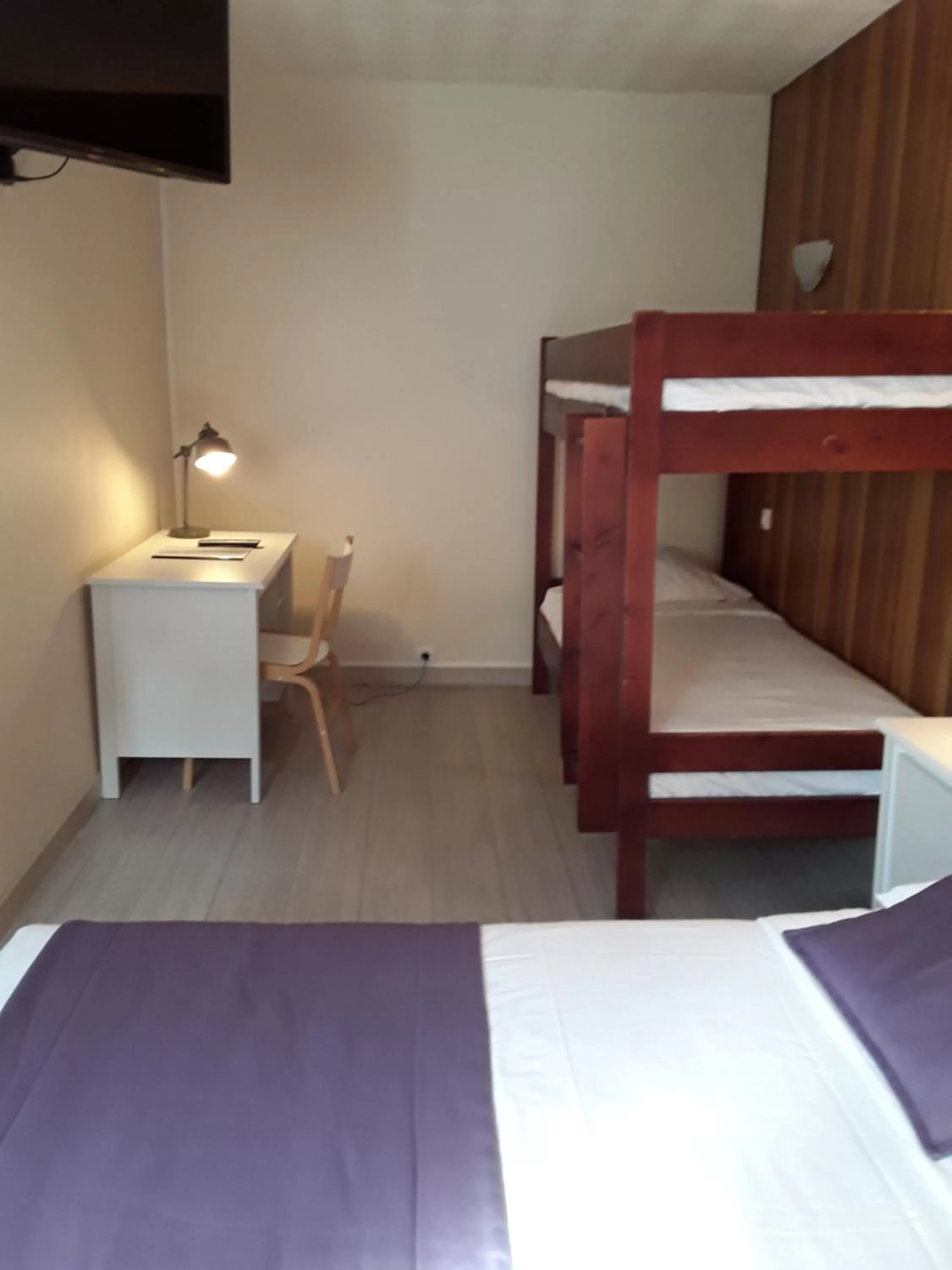 Photo of the whole room, Bed in Hôtel du Midi