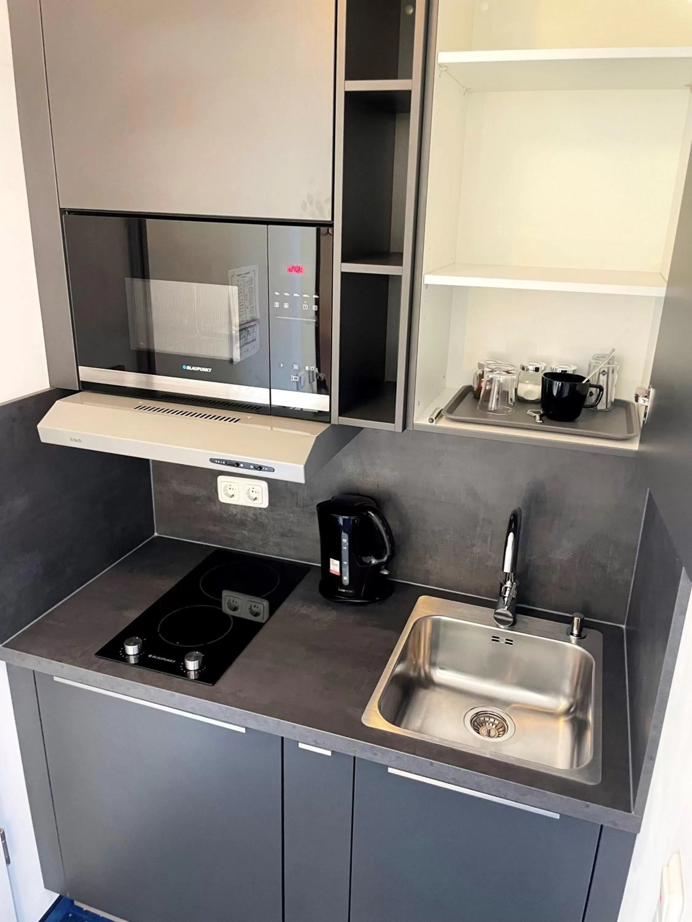 Kitchen or kitchenette in Runas Air Muc Park Sleep & Fly