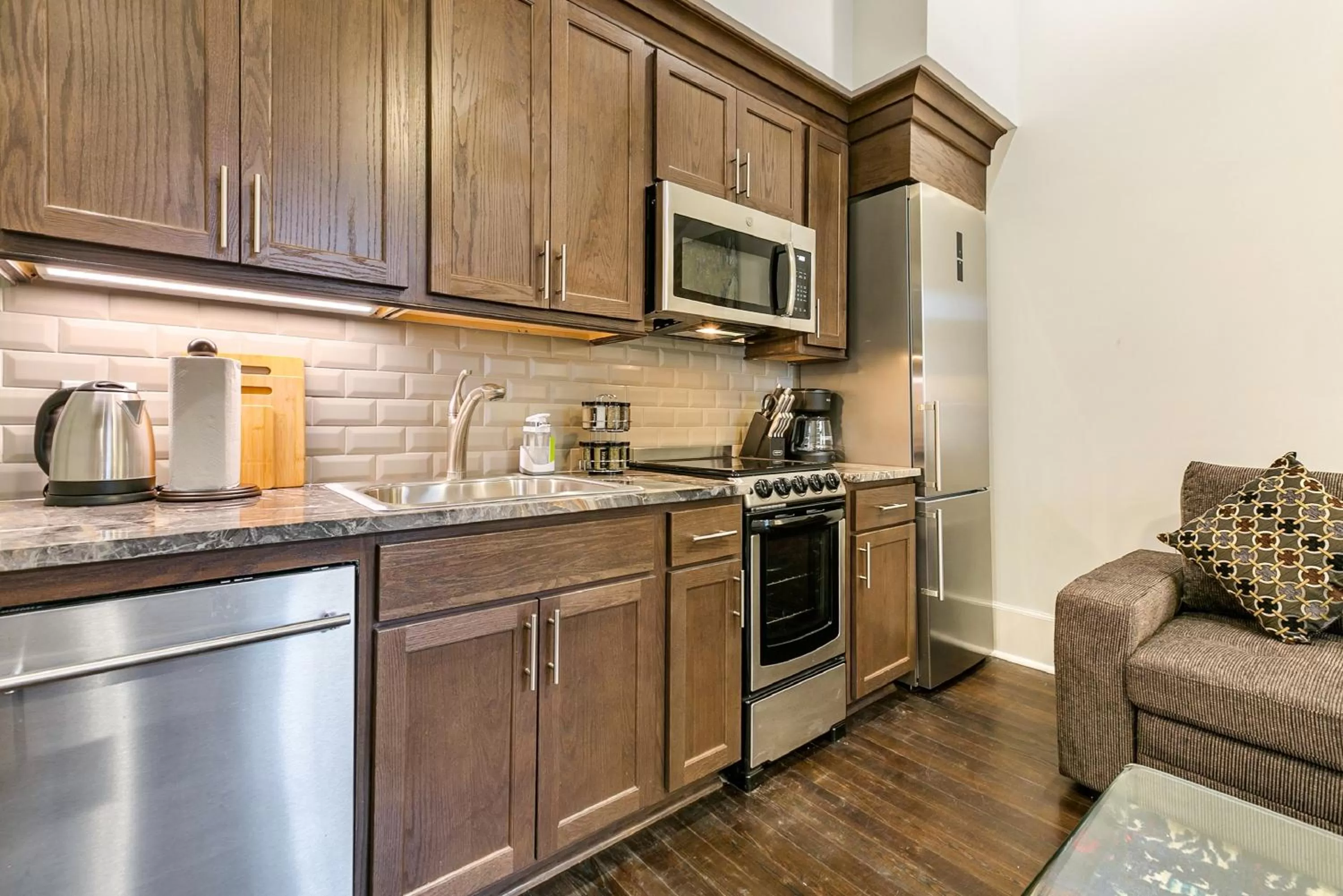 Kitchen or kitchenette in 1 and 2 BR Private Condos Steps Away From French Quarter