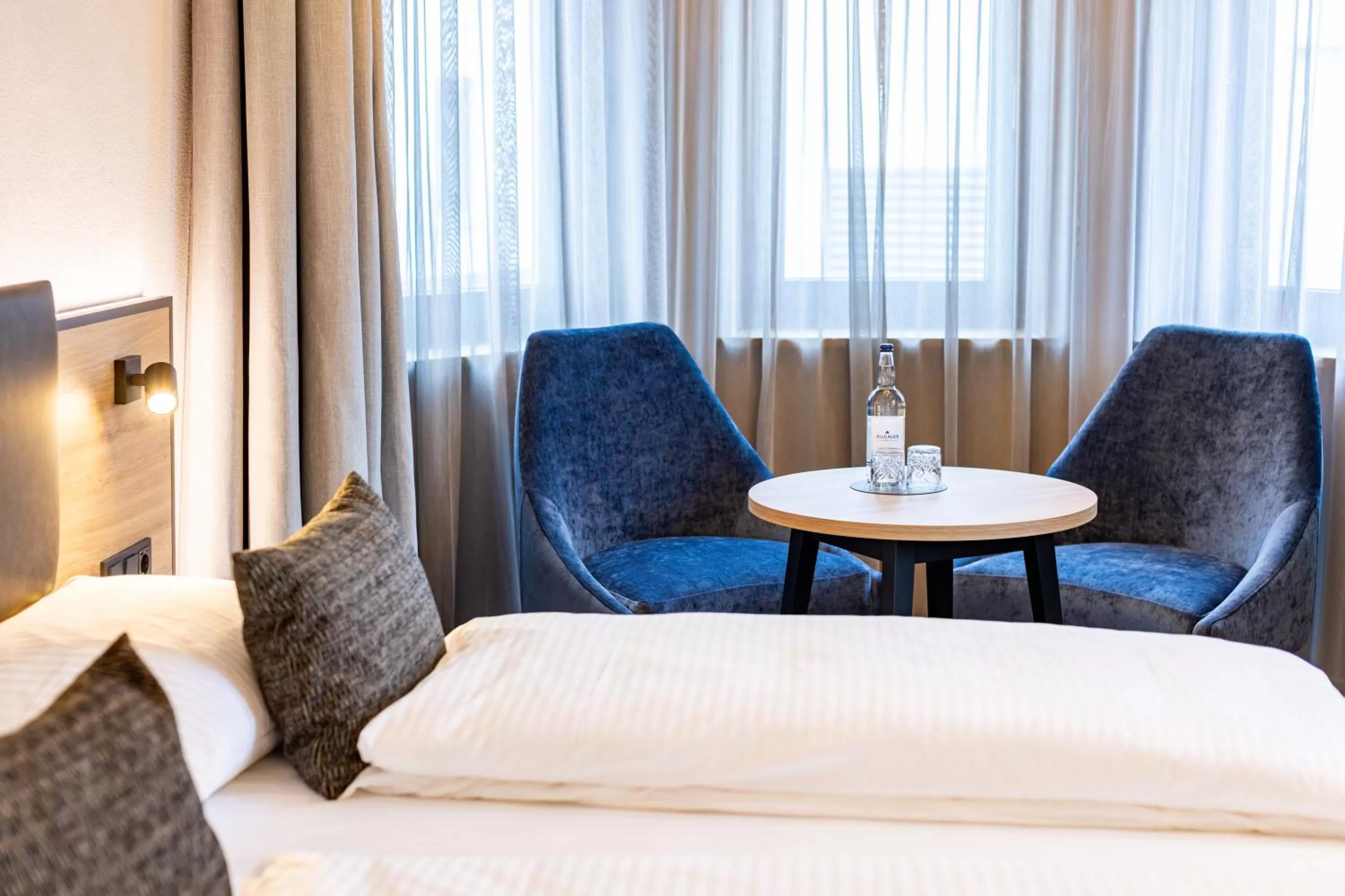 Seating area, Bed in BOLLWERK Lifestyle Hotel, automatisiertes Hotel mit Self Check In