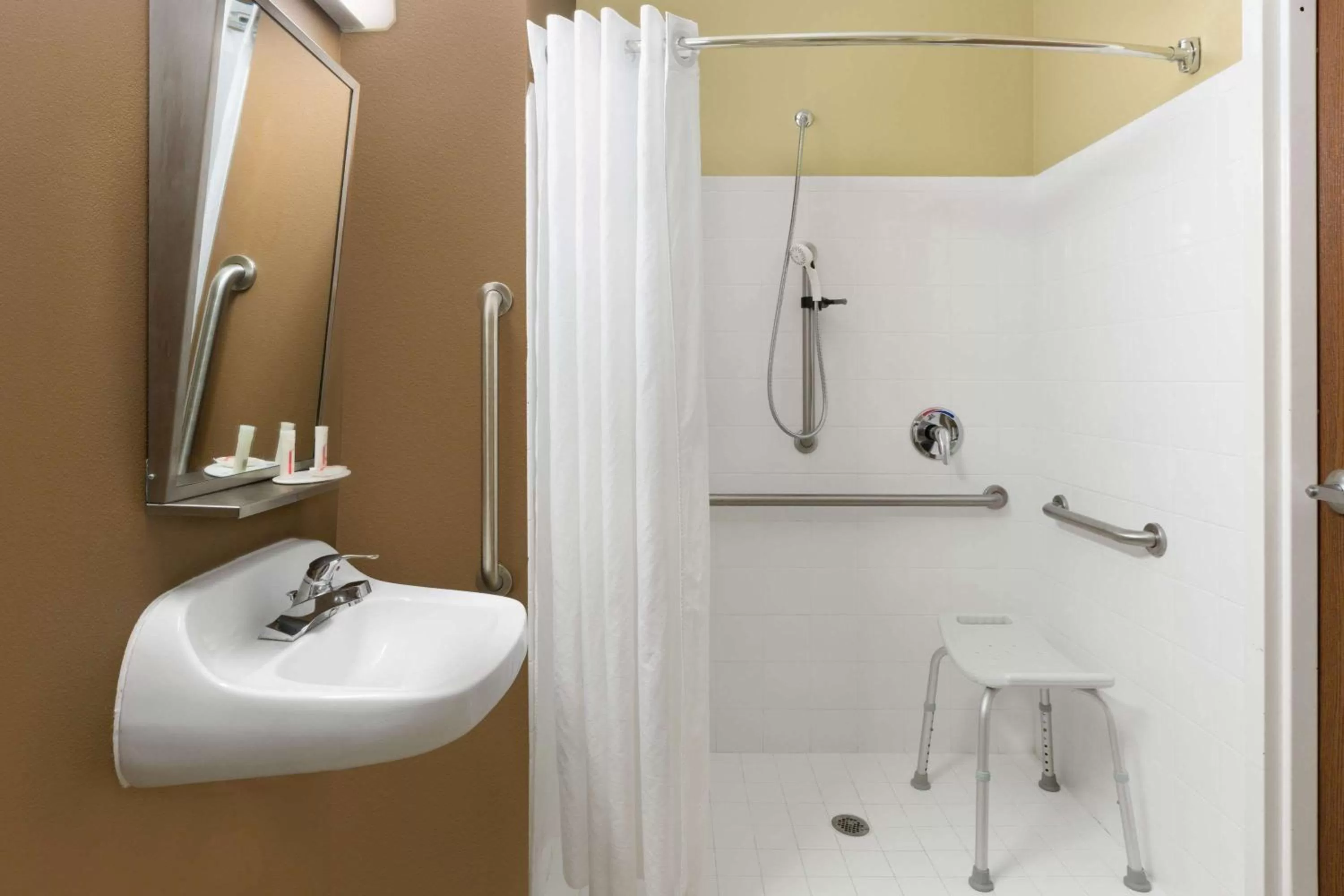 Shower in Microtel Inn & Suites by Wyndham Ozark