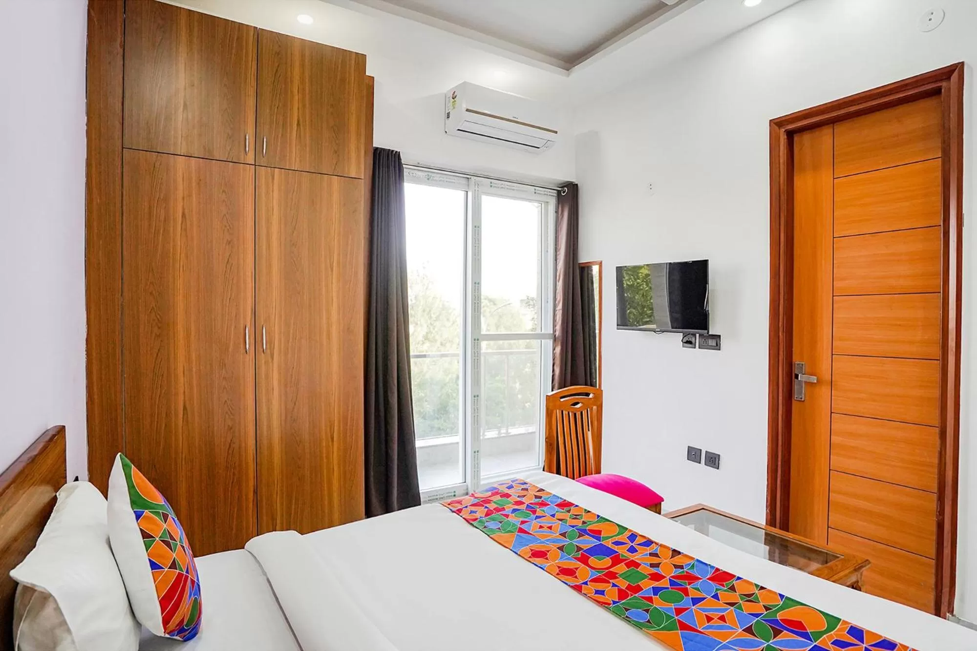 Bed in FabHotel Sunrise Sector 56