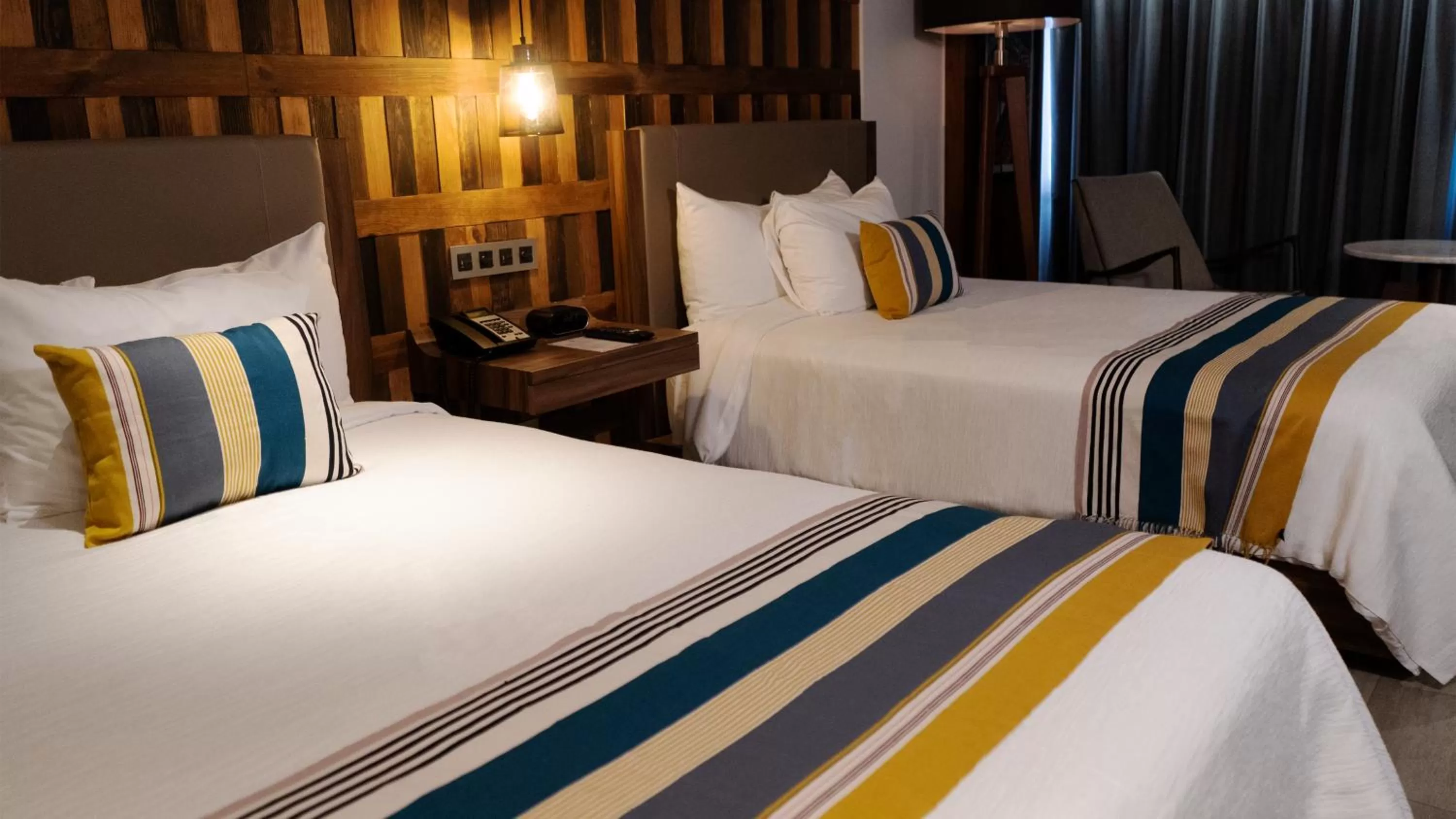 Bed in Hotel Indigo Guadalajara Expo by IHG