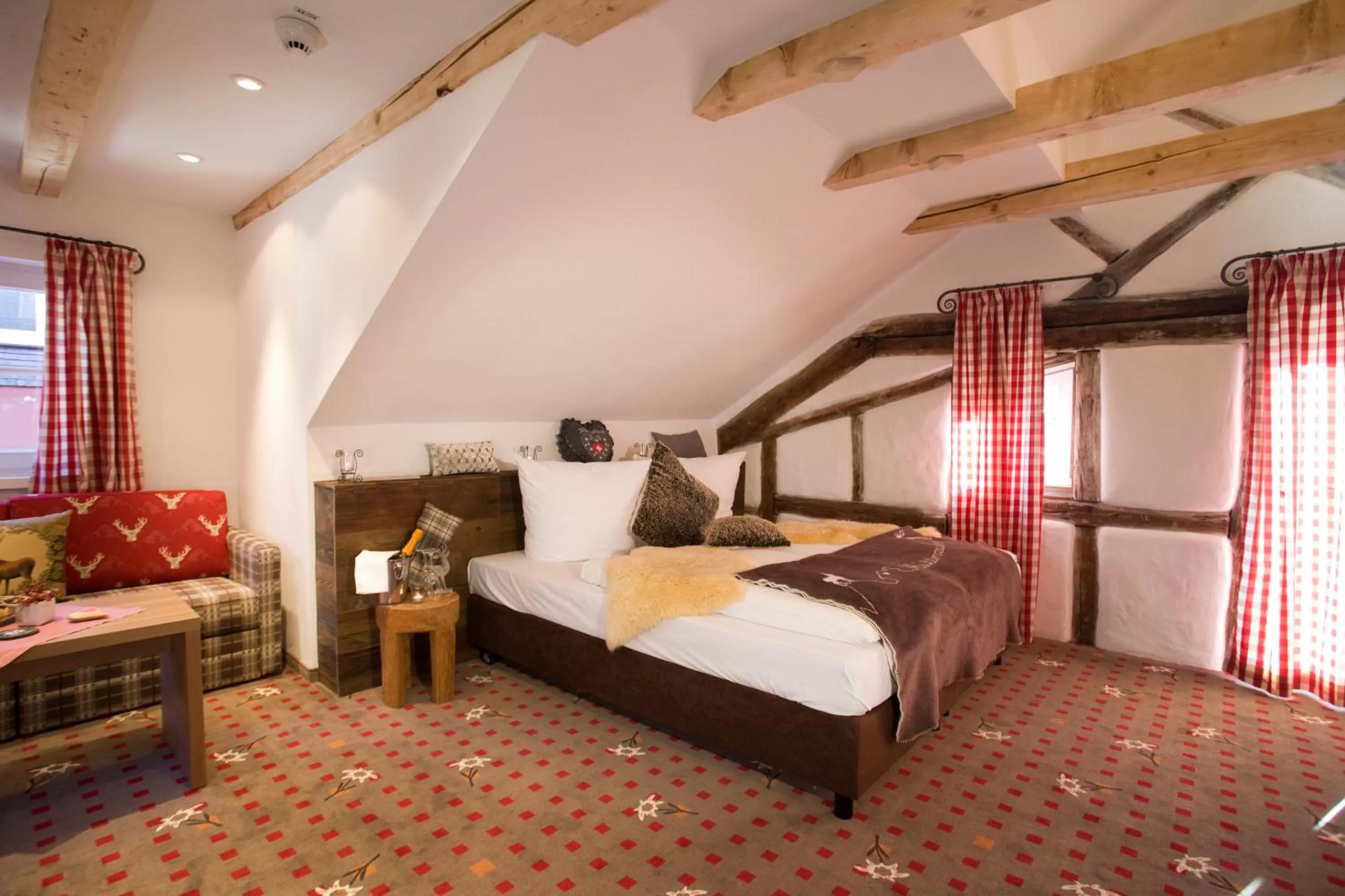 Photo of the whole room, Bed in Alpin Lifestyle Hotel Löwen & Strauss