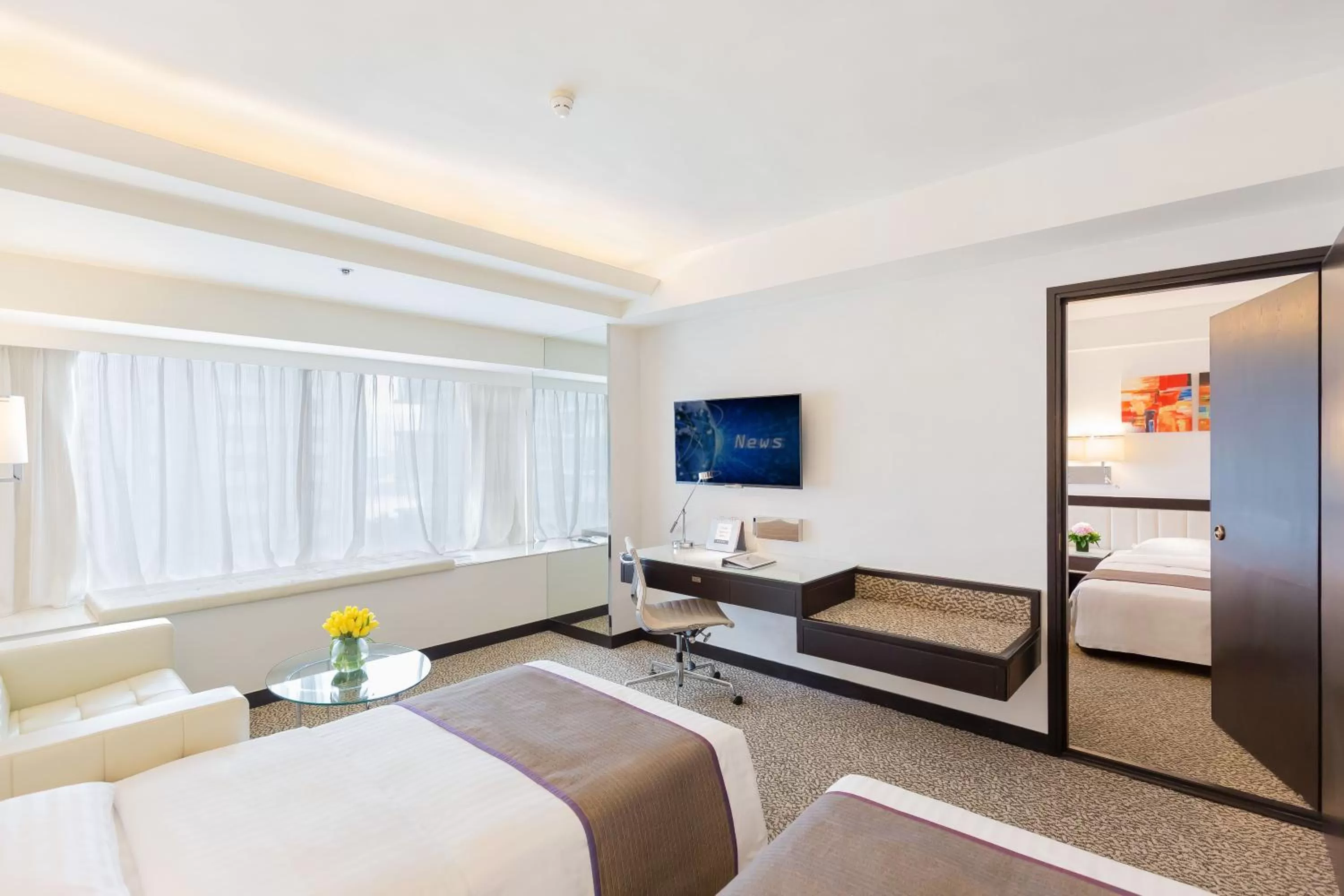 Bed in Regal Riverside Hotel