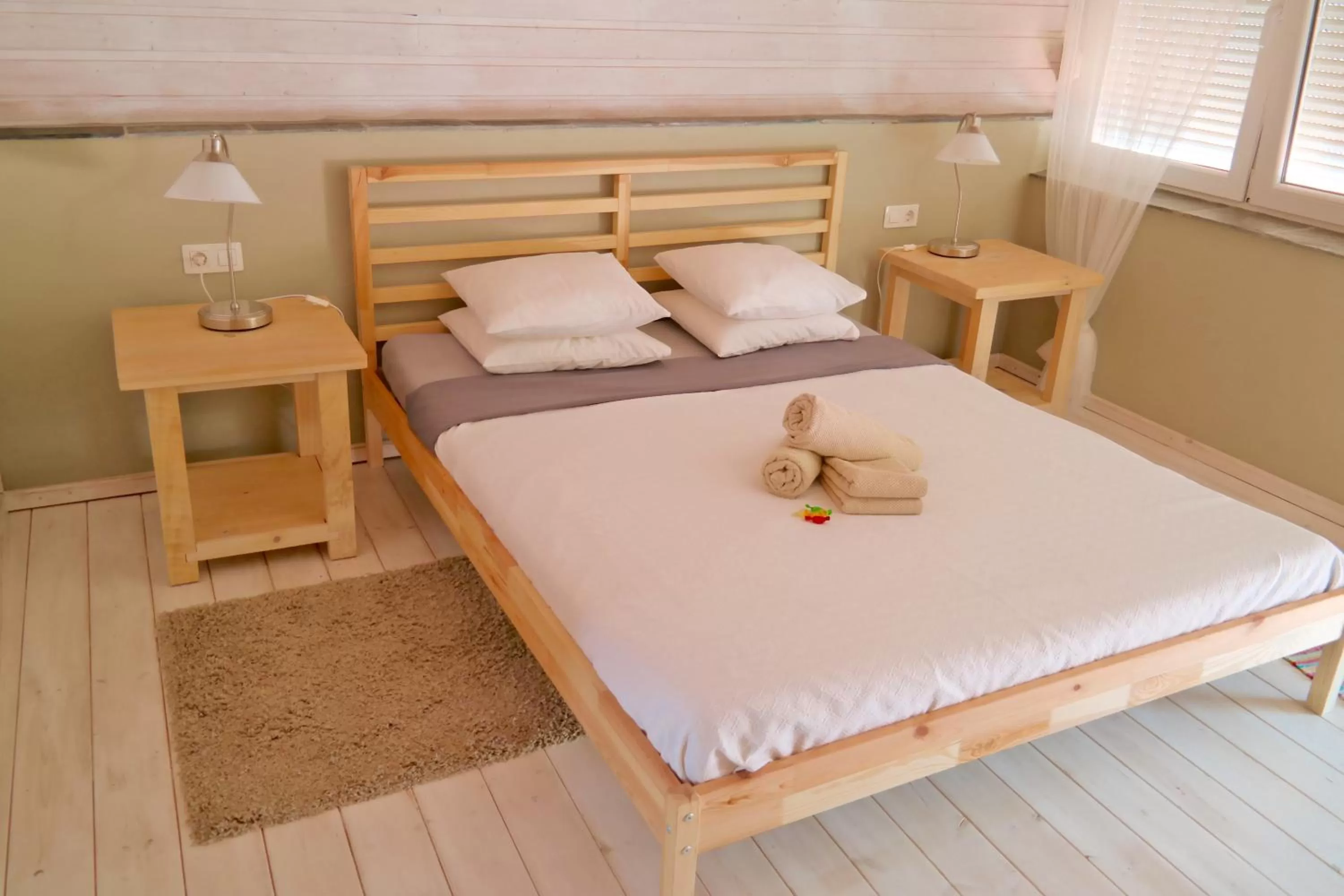 Bed in Sansofi Guesthouse