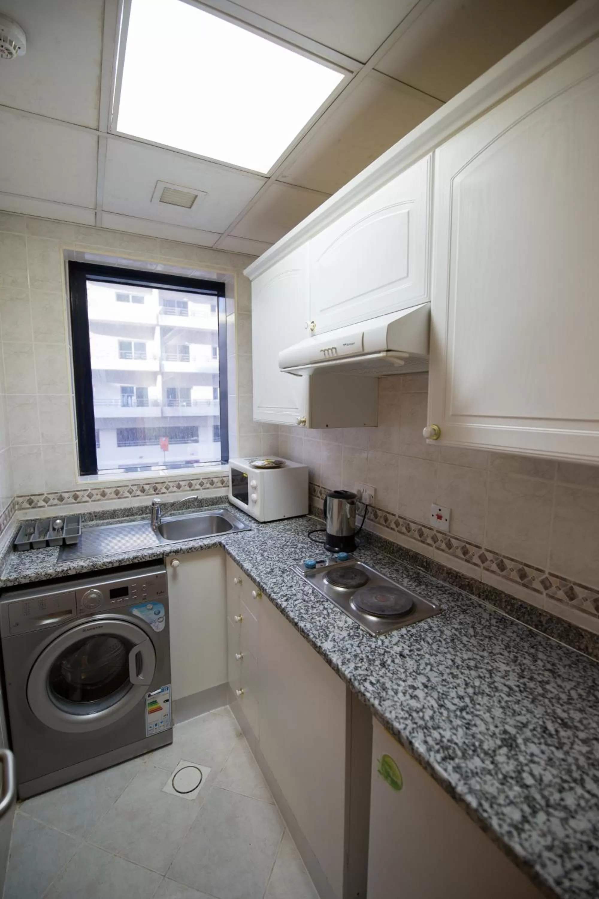 Kitchen or kitchenette in Welcome Hotel Apartments 1