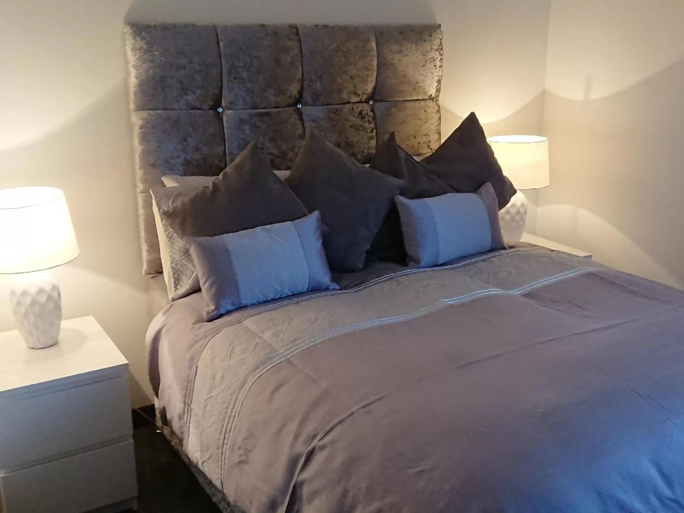 Bedroom, Bed in Glenfern Guest House and a separate Cottage with its own private hot tub