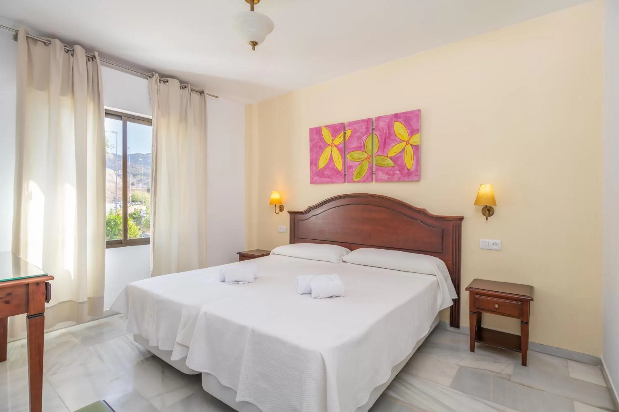 Bed in Apartahotel Playamaro by Dorobe