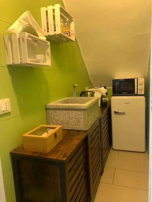 Kitchen/Kitchenette in Casetta Vigo