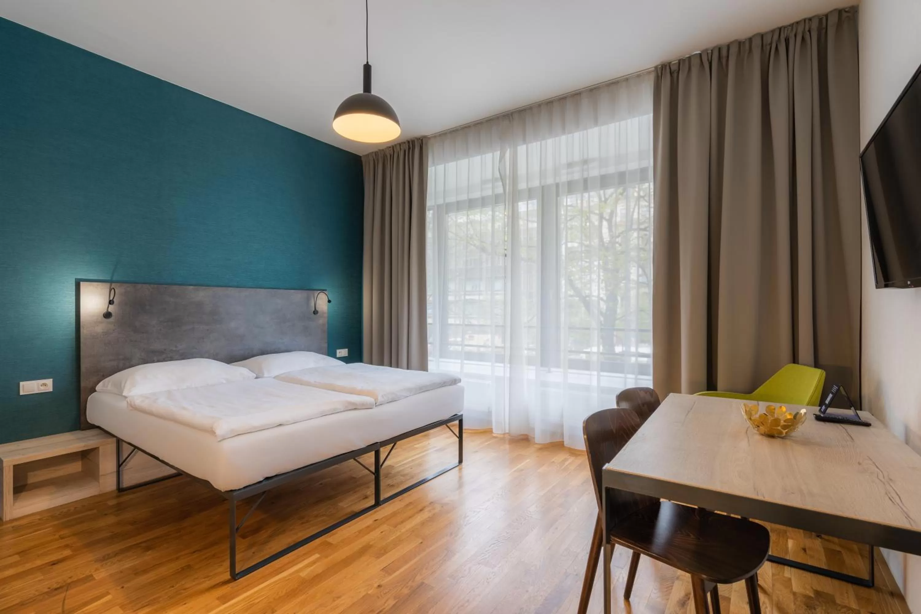 Bed in EA ApartHotel Melantrich