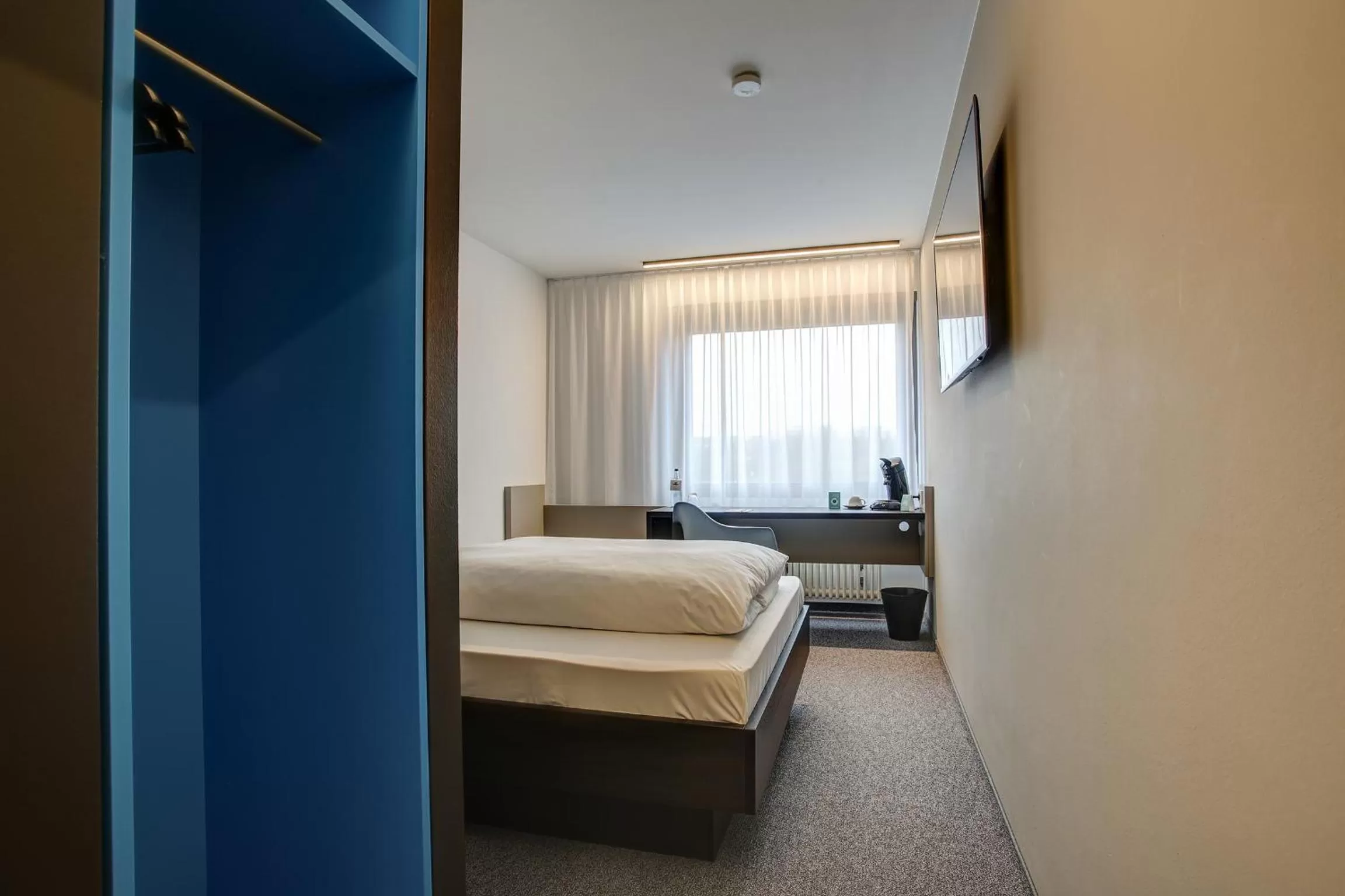 Photo of the whole room, Bed in Centro Park Hotel Stuttgart, Trademark Collection by Wyndham