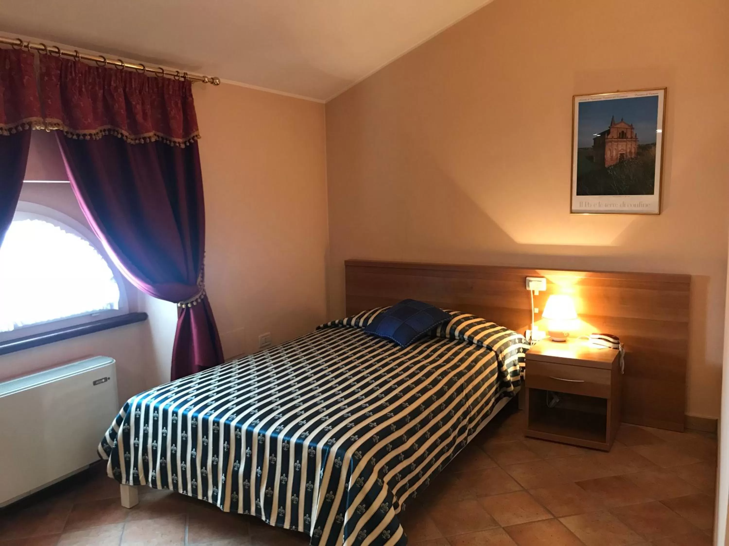 Bedroom in Locanda Ca’ Rossa