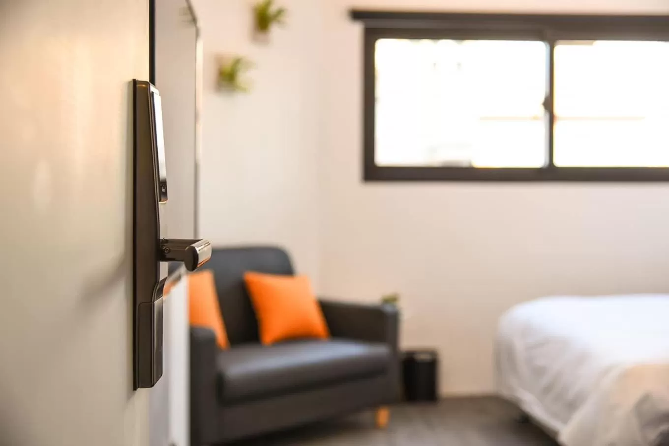 Seating area, Bed in Wountain Hotel