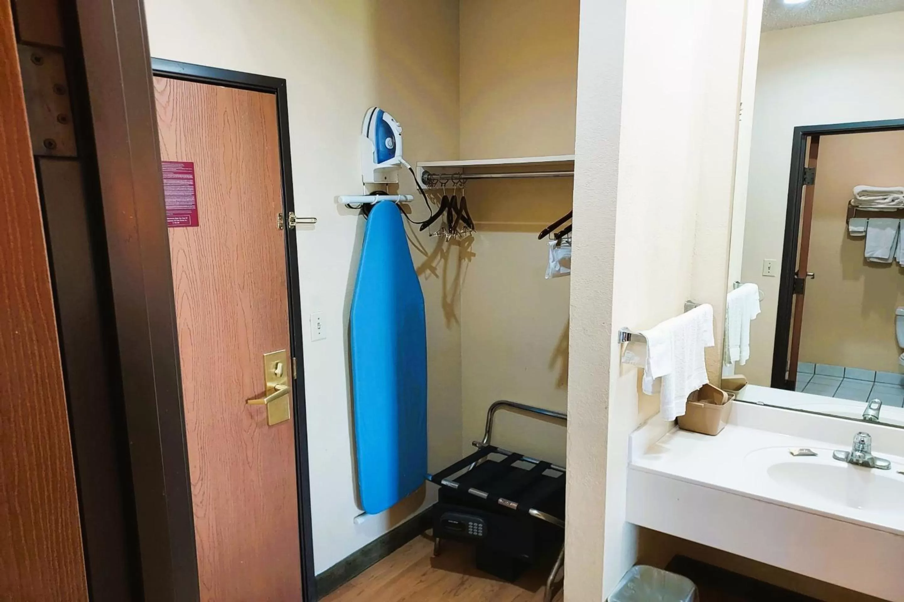 Bathroom in McPherson Inn By OYO, I-135