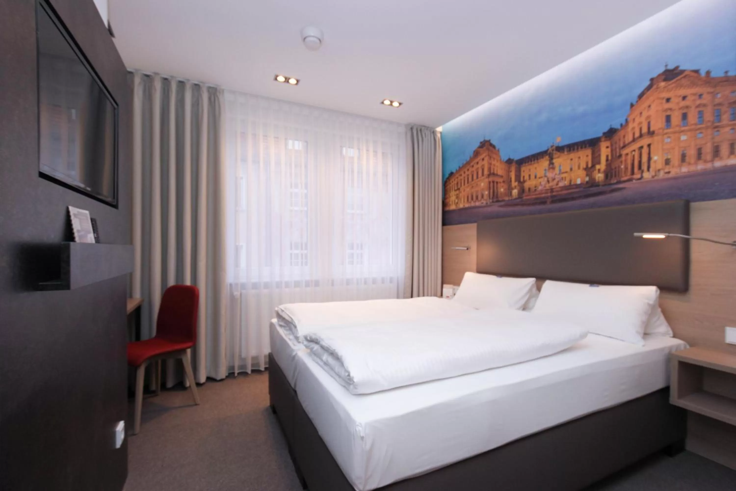 Bed in City Hotel Würzburg