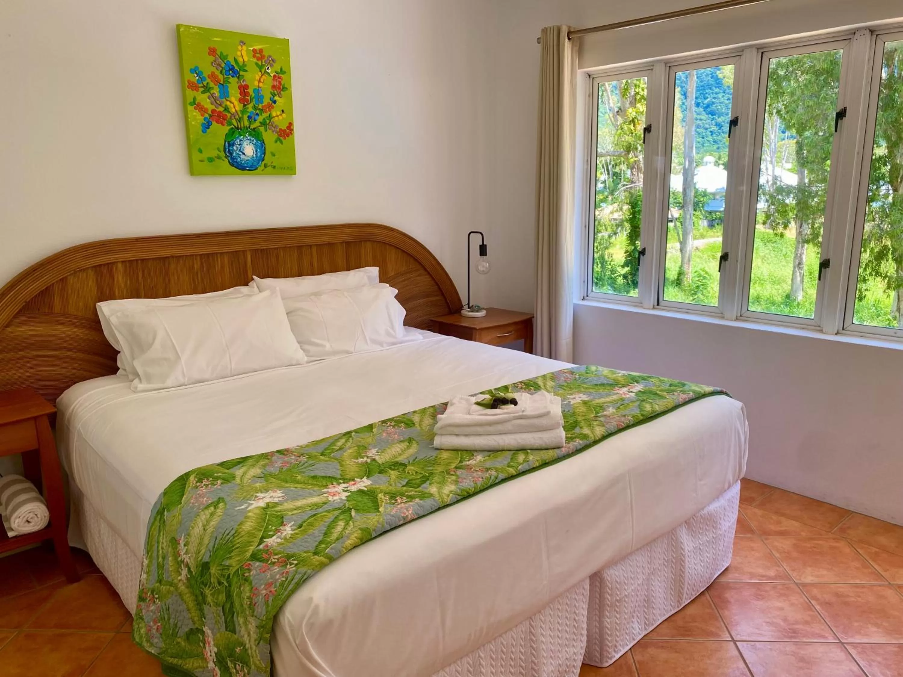 Bed in BeachView Apartments at Villa Paradiso