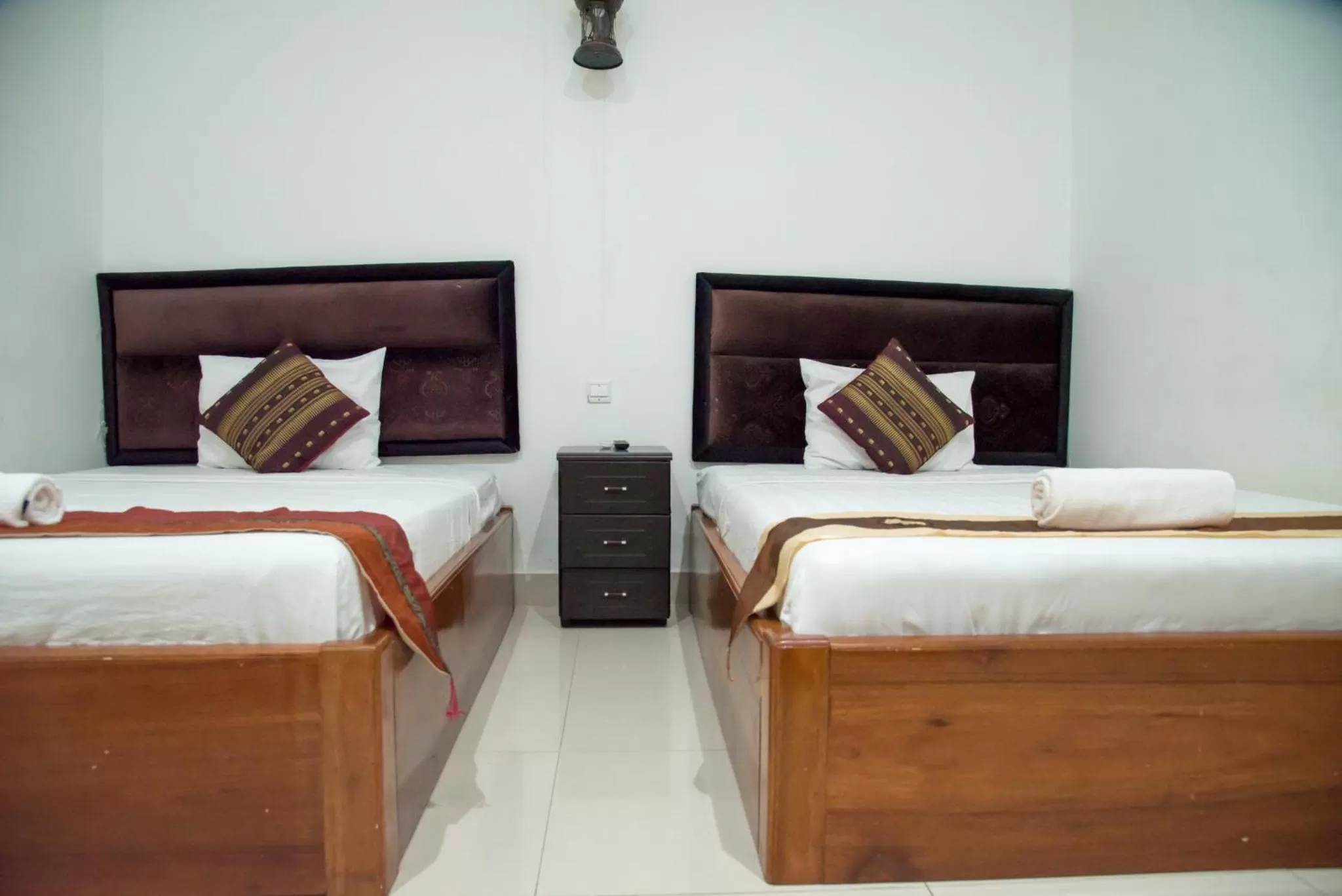 Bed in New Season Riverside Hotel