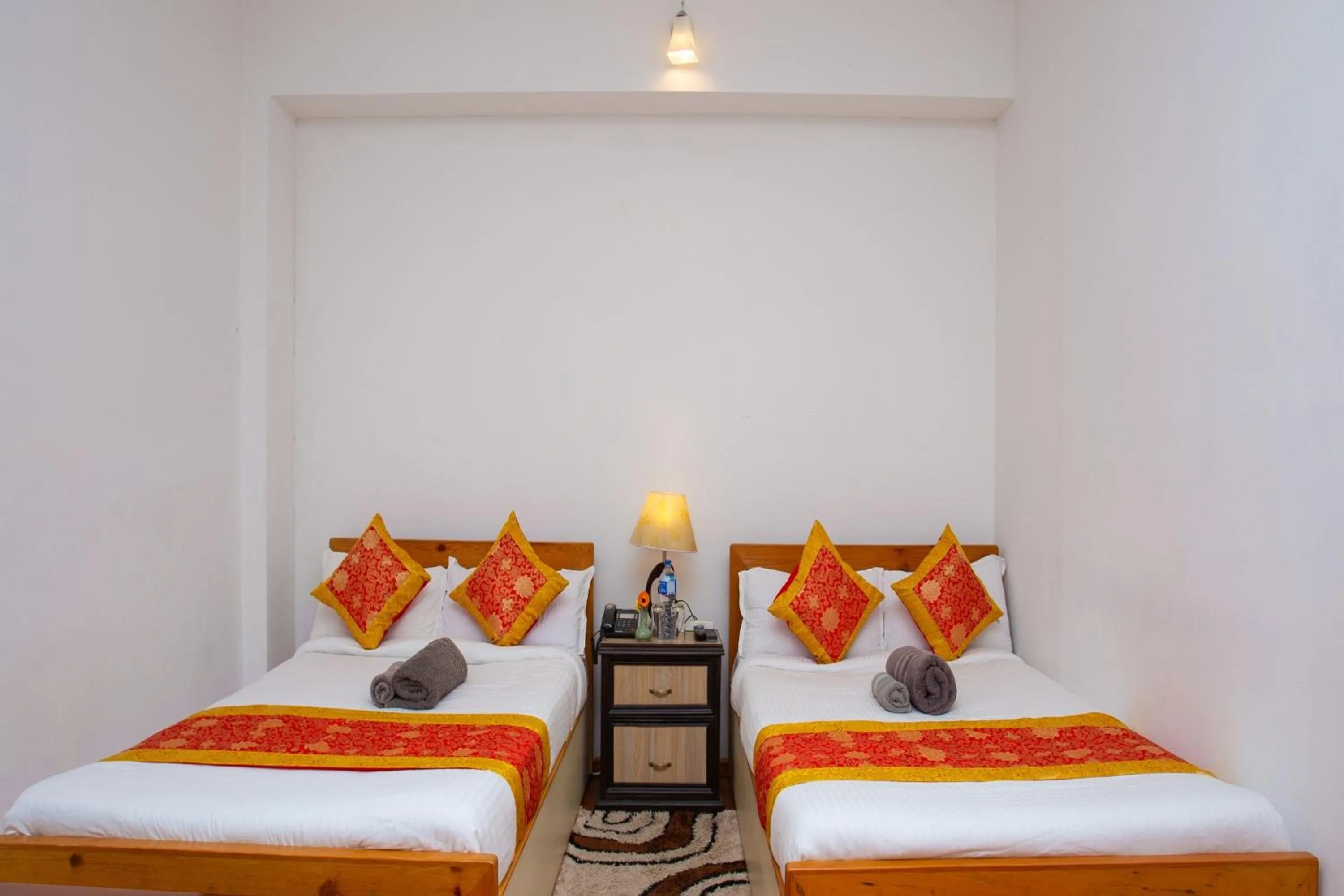 Photo of the whole room, Bed in The Boudha Inn