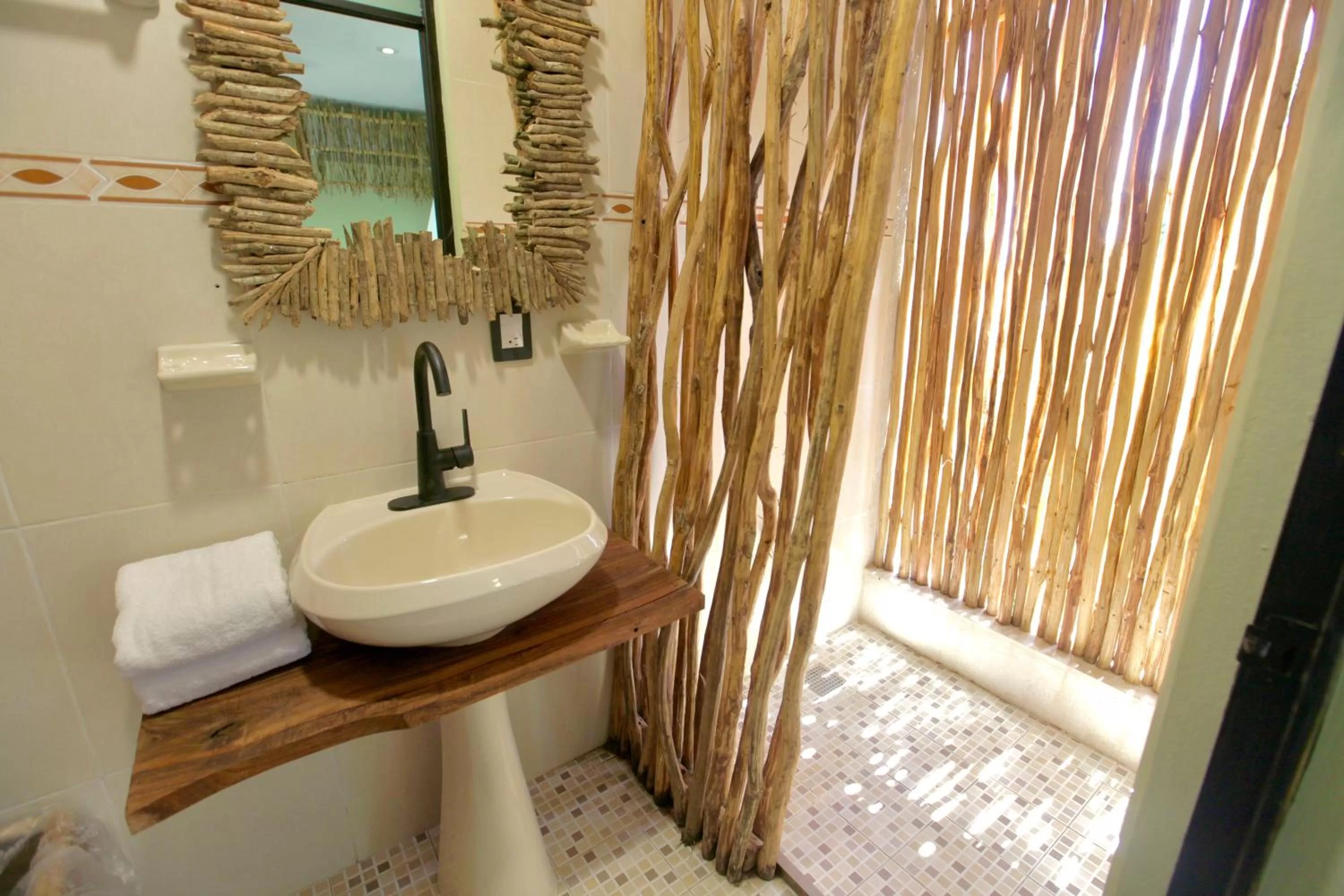 Bathroom in LA TULUMEÑA Boutique Hotel