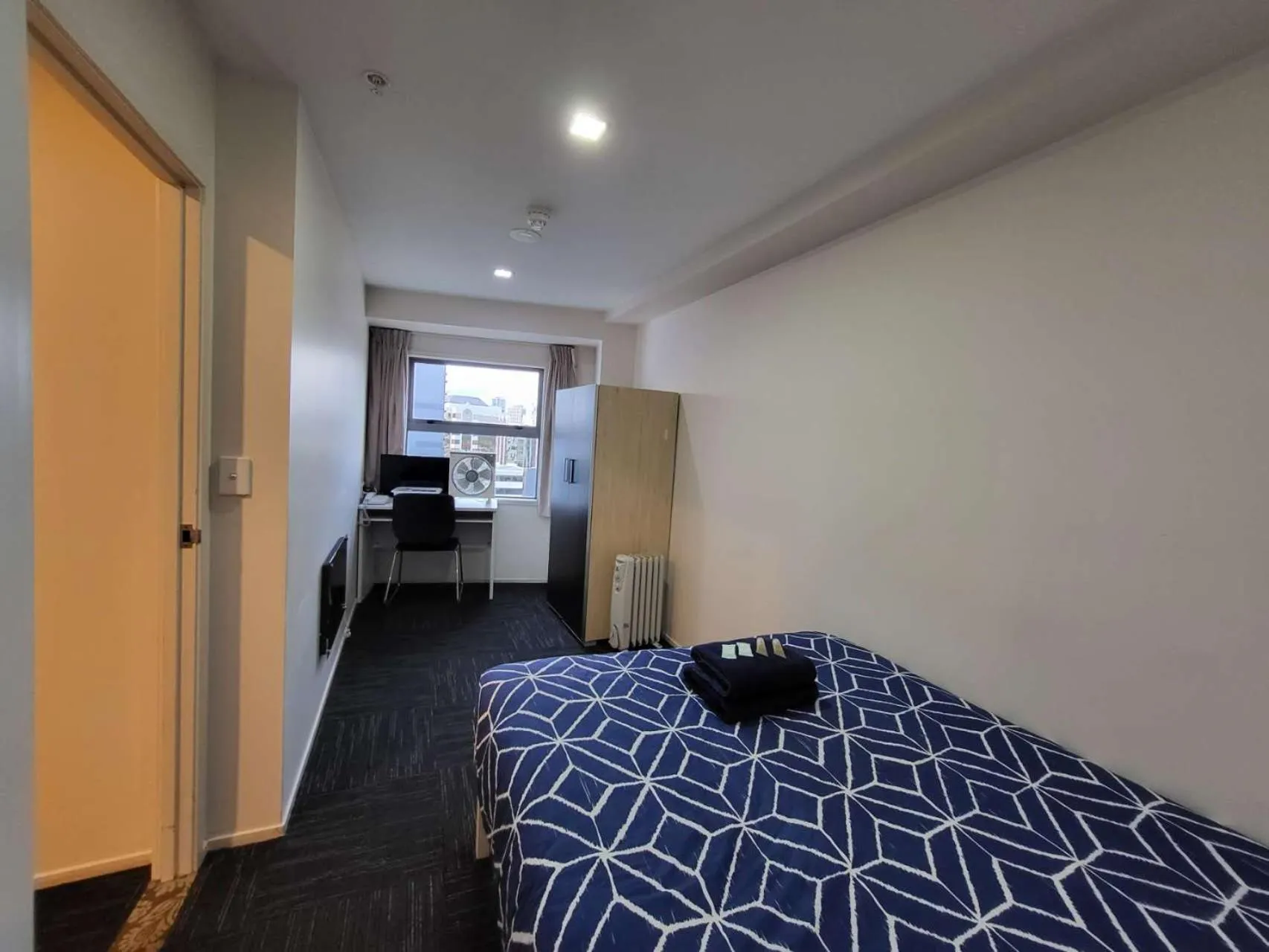 Bed in Empire Apartments