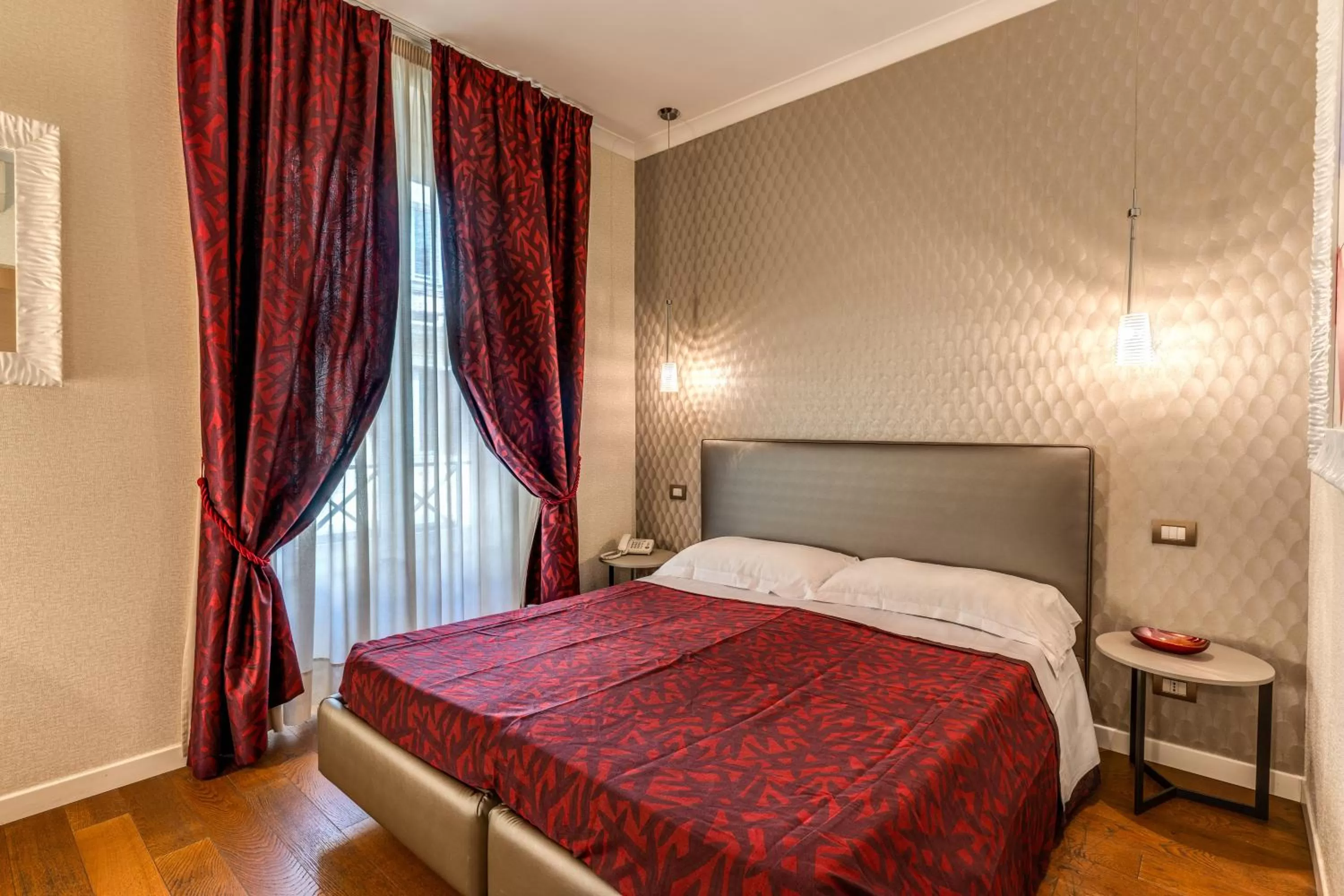 Bed in Roma Boutique Hotel